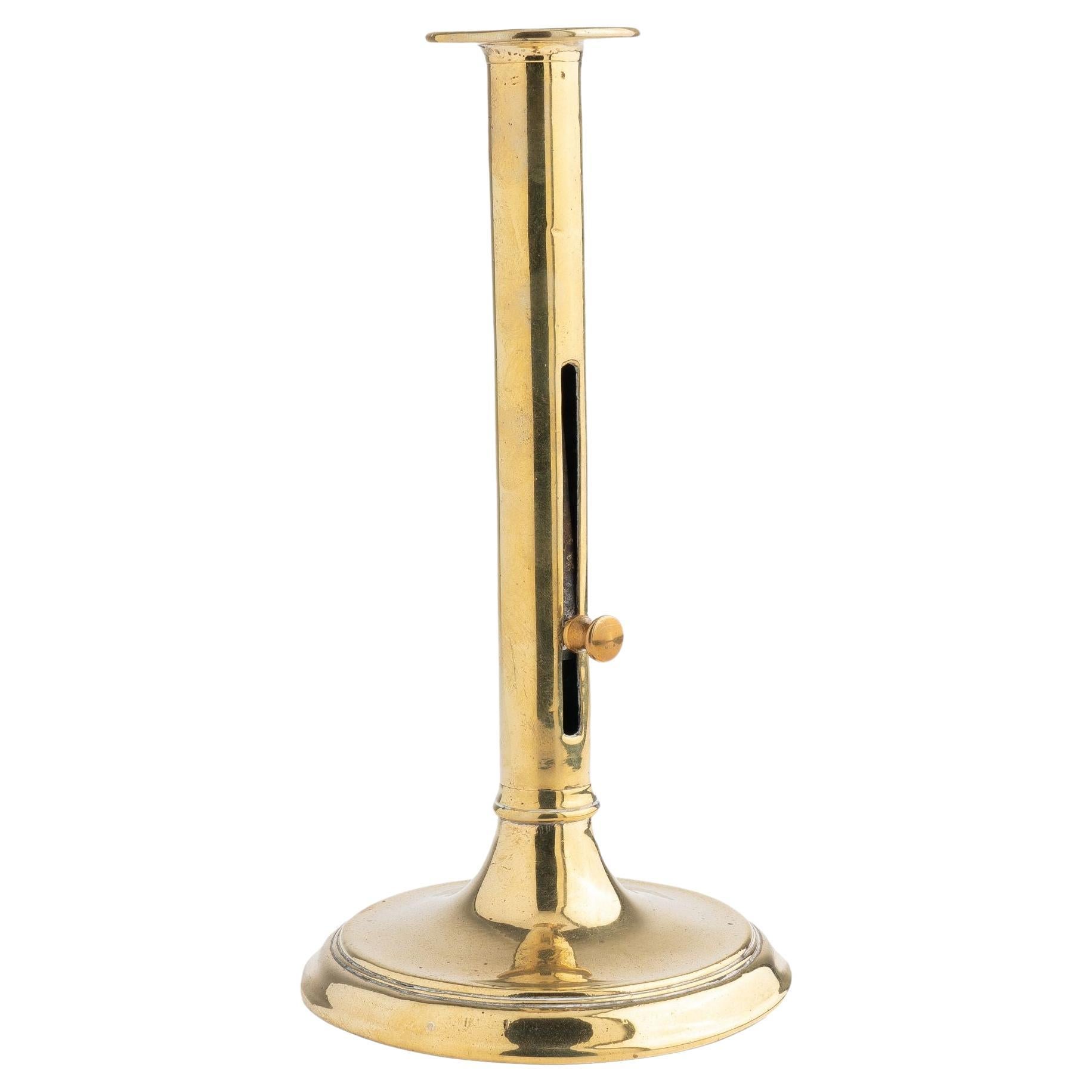English cannon barrel cast brass ejector slide candlestick, 1820 For Sale