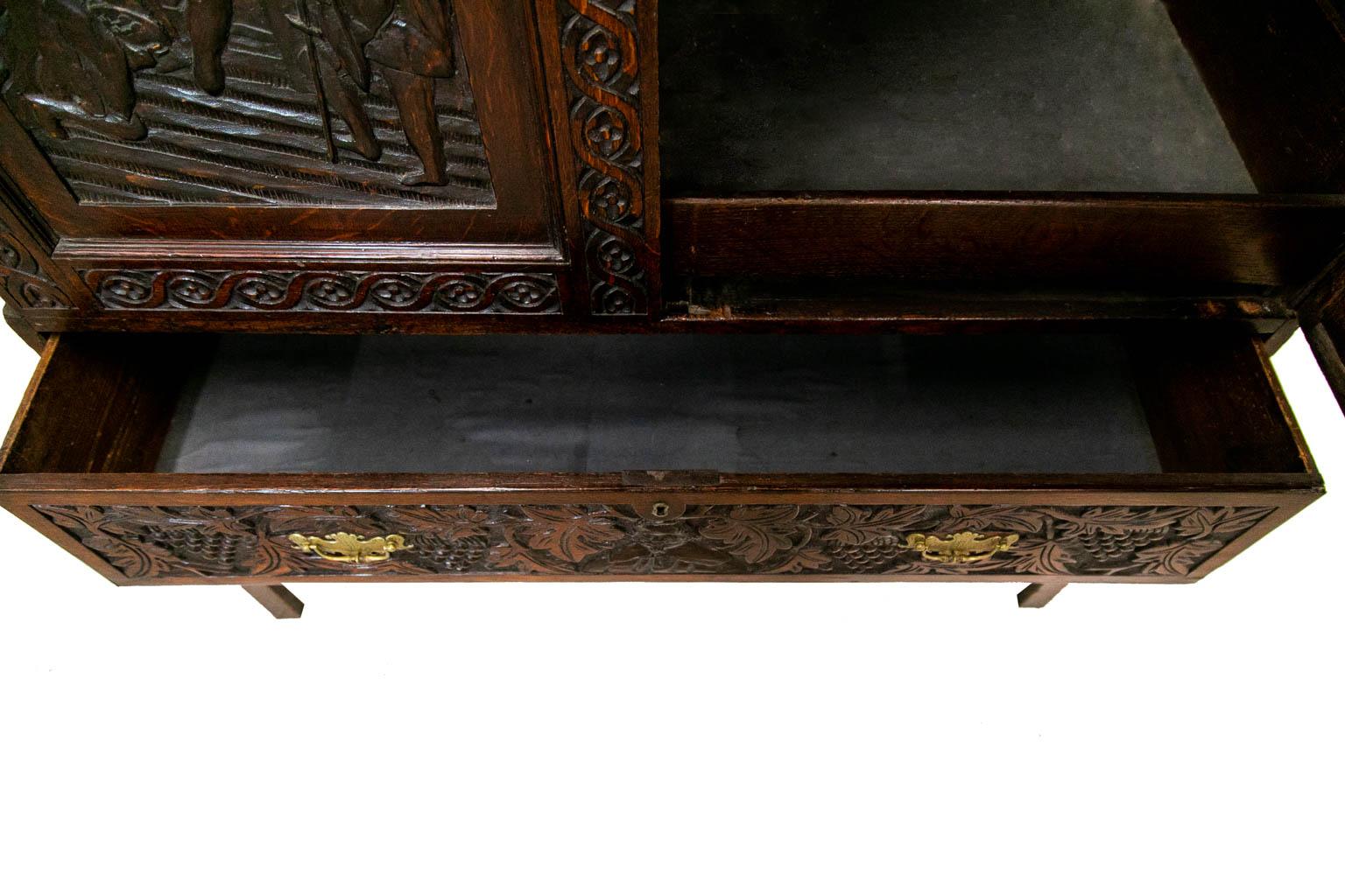 Mid-19th Century English Carved Oak Cabinet on Stand For Sale