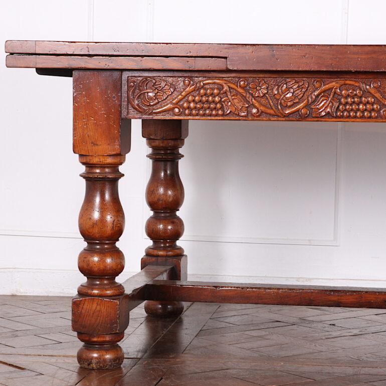 20th Century English Carved Oak Extending Trestle Table