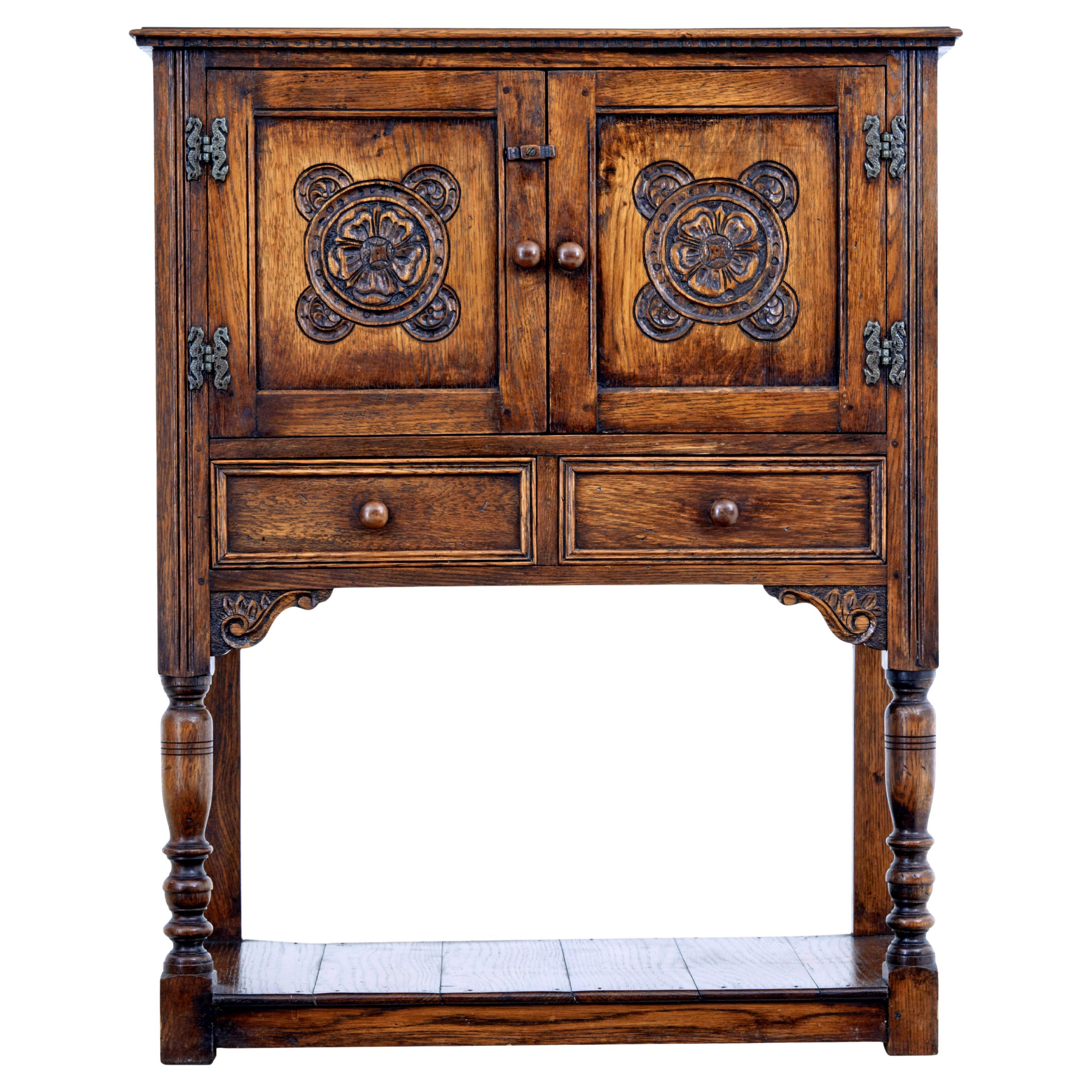 English carved oak gothic revival cupboard