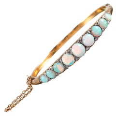 Antique “English Carved” Opal and Diamond Bangle Bracelet