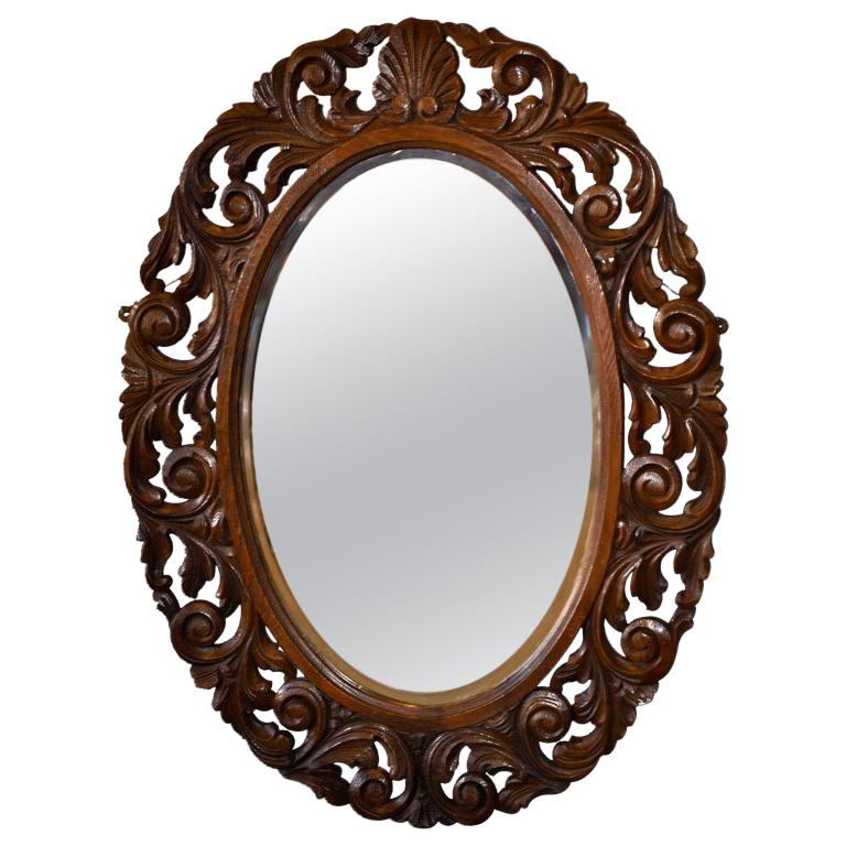 English Carved Oval Wall Mirror For Sale