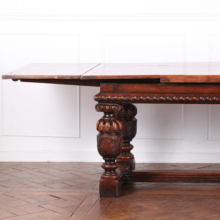 20th Century English Carved Solid Oak Draw-Leaf Trestle Table