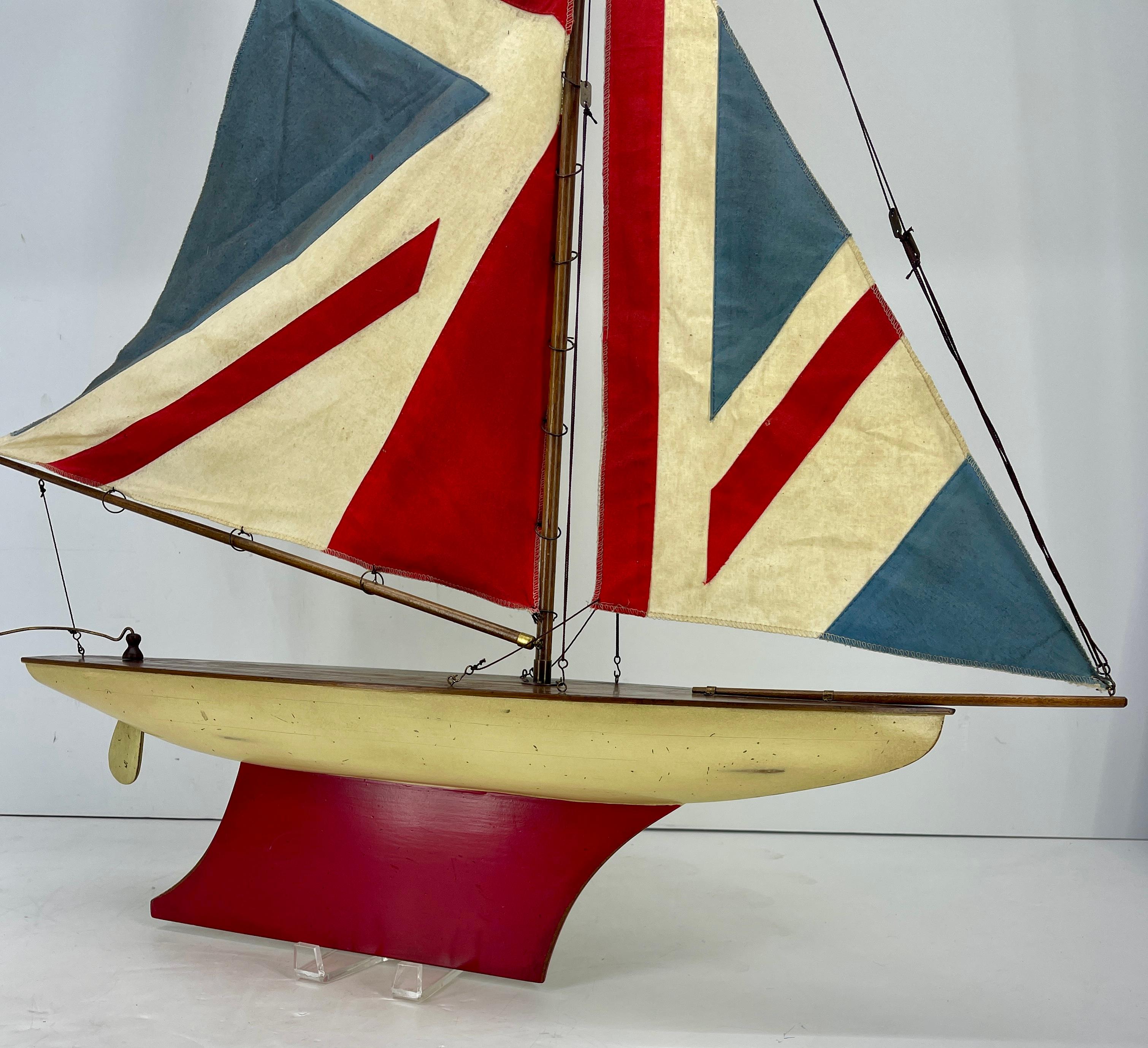 Folk Art English Carved Wood Sailboat Model with Parquetry Deck and Union Jack Sailcloth