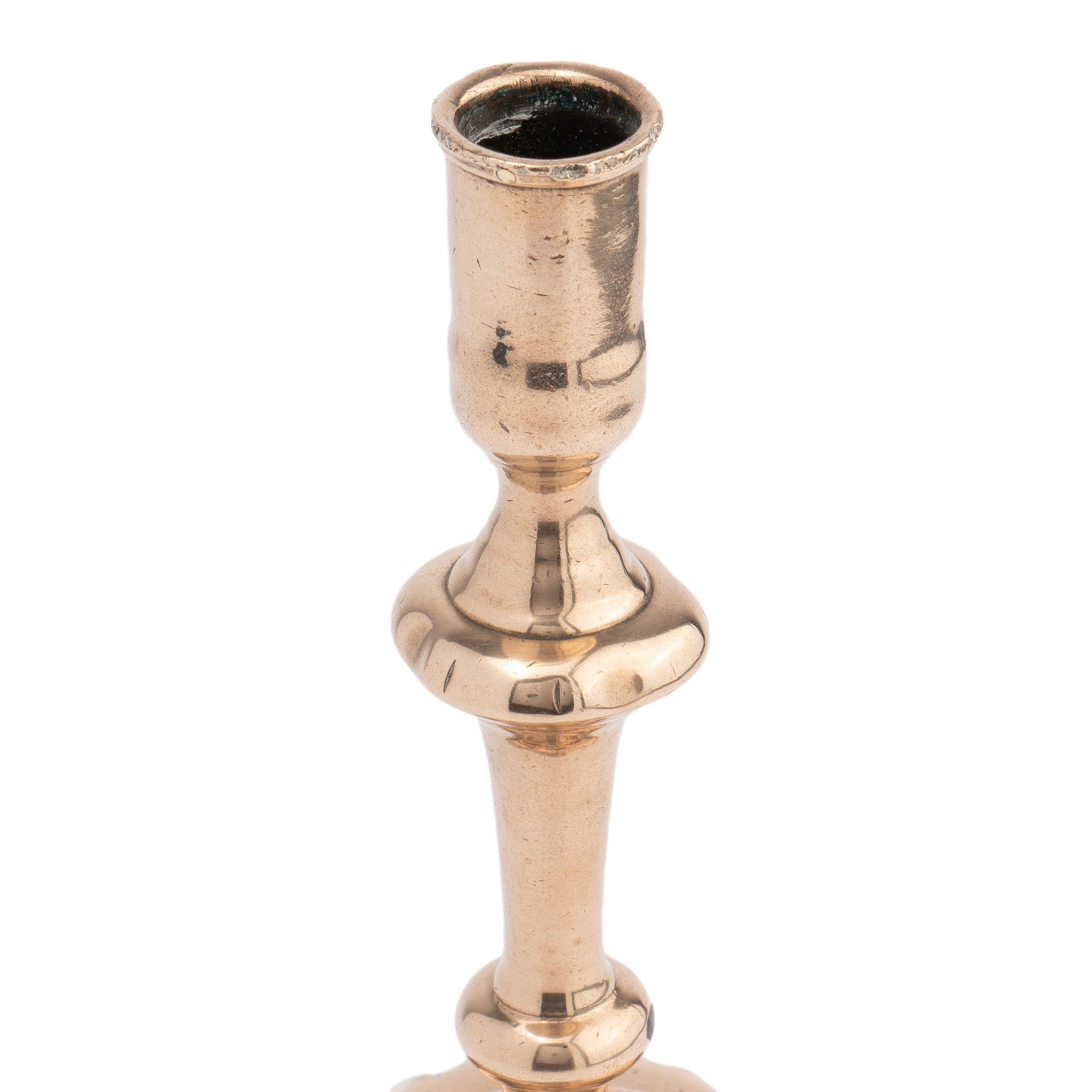 18th Century English cast bell metal Queen Anne baluster shaft candlestick, 1750-60 For Sale