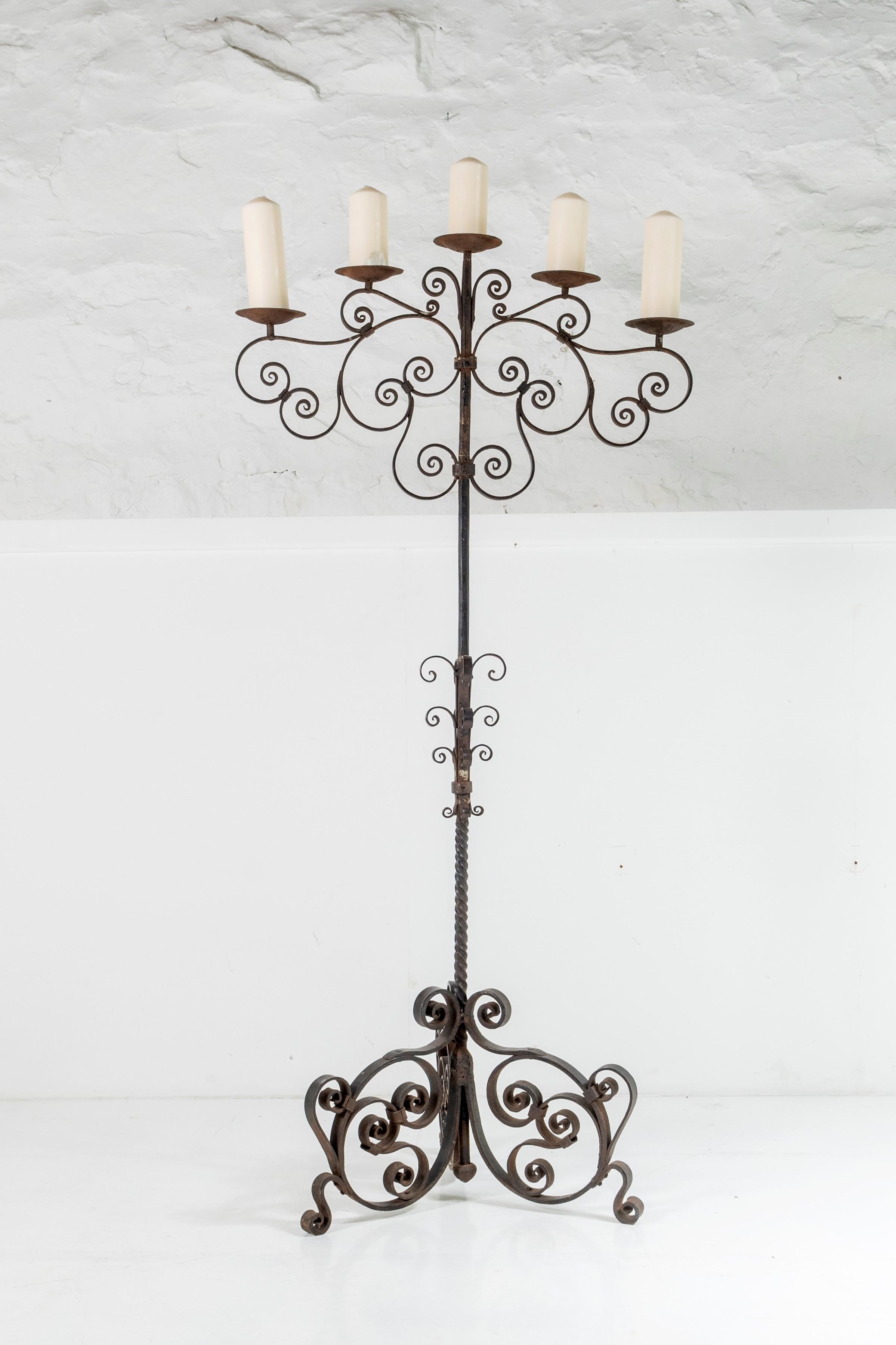 A wonderful 19th century wrought iron candelabra, heavy form blacksmith made with lovely scroll details. The 5 arm candle tree is almost 3ft across, each candle holder is 4.75 diameter.
Circa 1890, this is a wonderful estate made piece of the