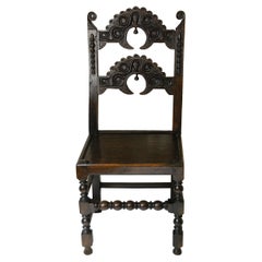 English Charles II Carved Oak Backstool with Head Motif, 17th Century