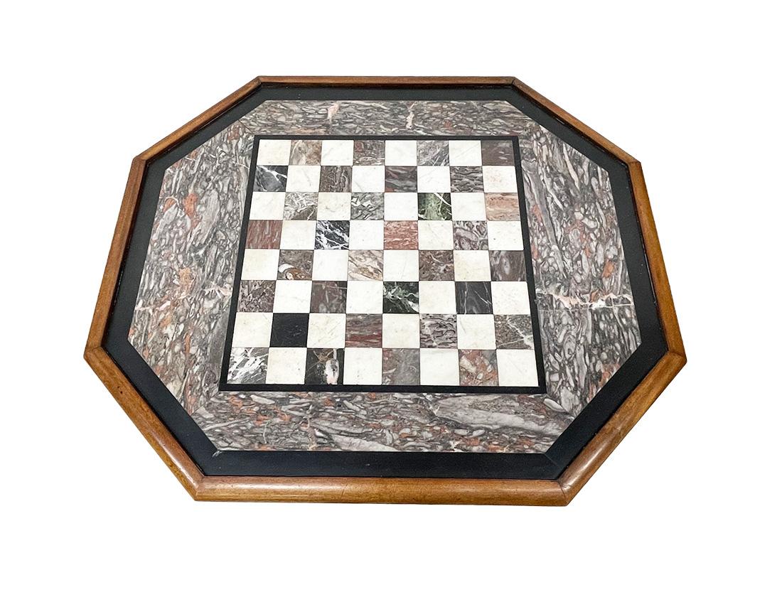 English chess table with marble inlay, by Crook Richard and Son, c. 1840

An English mahogany chess table, by Richard and Son Crook, furniture makers and upholsterers, 50, Boutport street Barnstaple, c.1840. On each side of the table is a drawer for