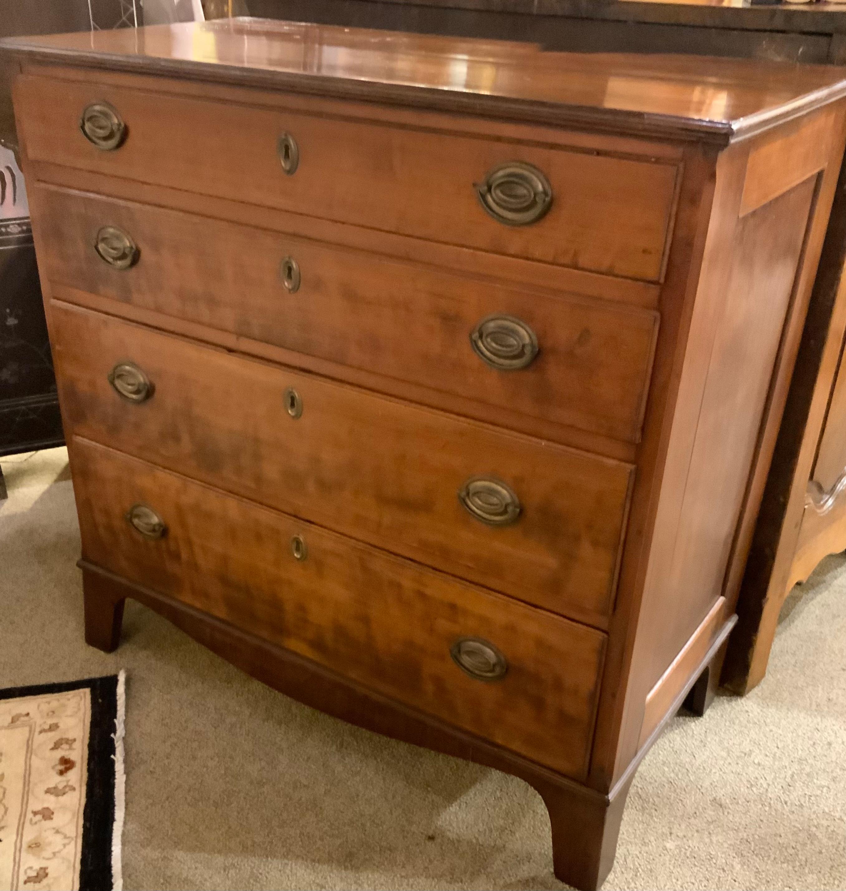 Antique mahogany chest of four drawers provides good
Storage. The drawers slide easily and the finish is beautiful.
The drawers have good dove tail construction. It stands
On bracket feet. It has been French polished.
