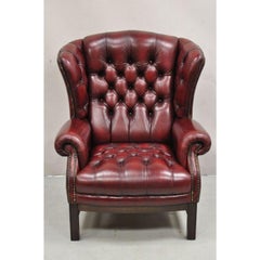 English Chesterfield Oxblood Burgundy Leather Tufted Wingback Chair and Ottoman