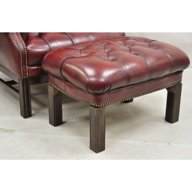 20th Century English Chesterfield Oxblood Burgundy Leather Tufted Wingback Chair and Ottoman