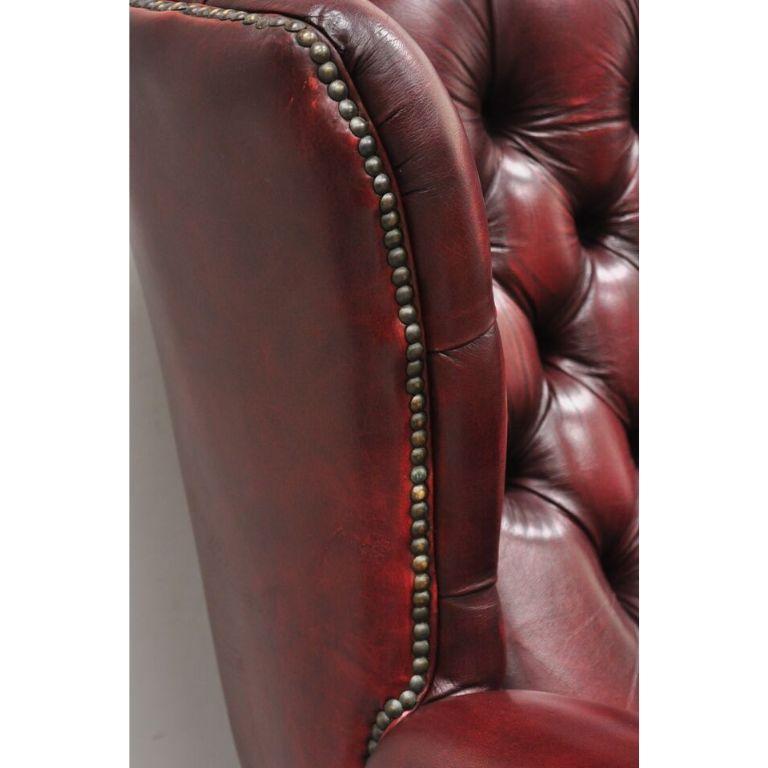 English Chesterfield Oxblood Burgundy Leather Tufted Wingback Chair and Ottoman For Sale 4