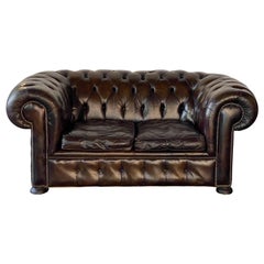 Canapé Chesterfield anglais en cuir touffeté