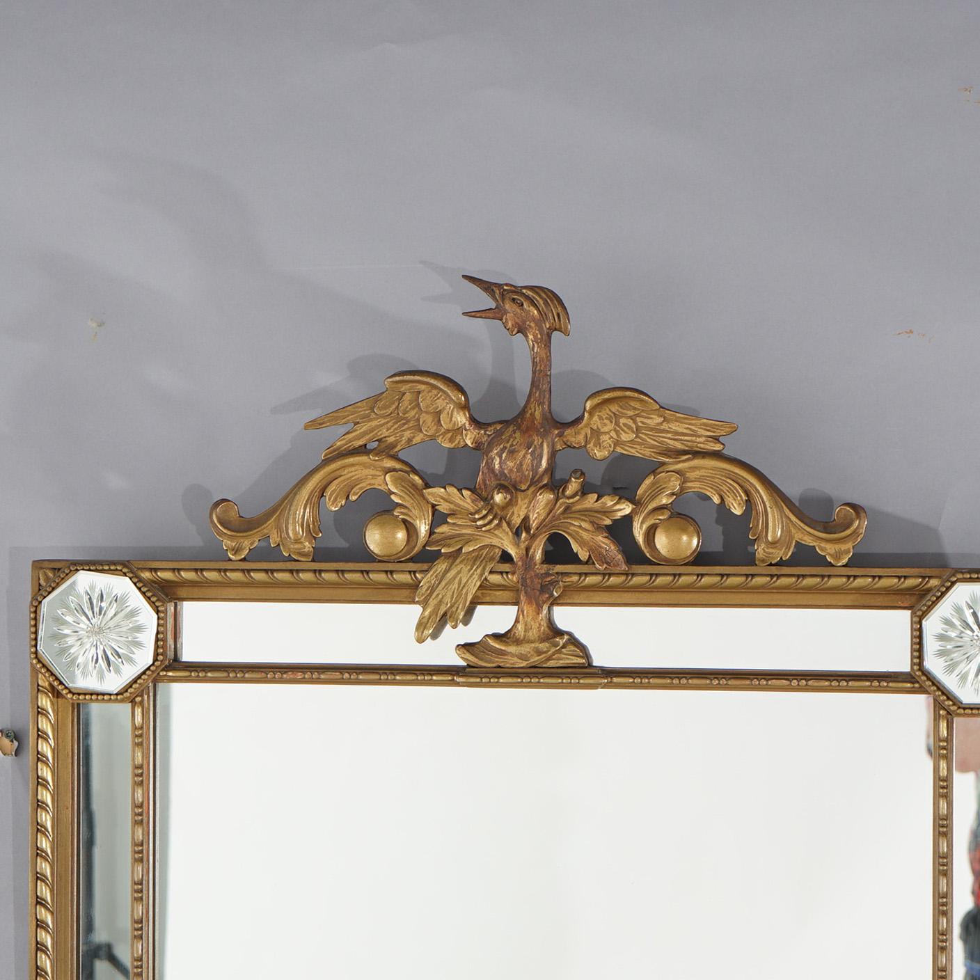 An antique English Chinese Chippendale parclose wall mirror in Regency style offers giltwood frame with figural phoenix crest, c1920

Measures- 46''H x 29''W x 2.5''D