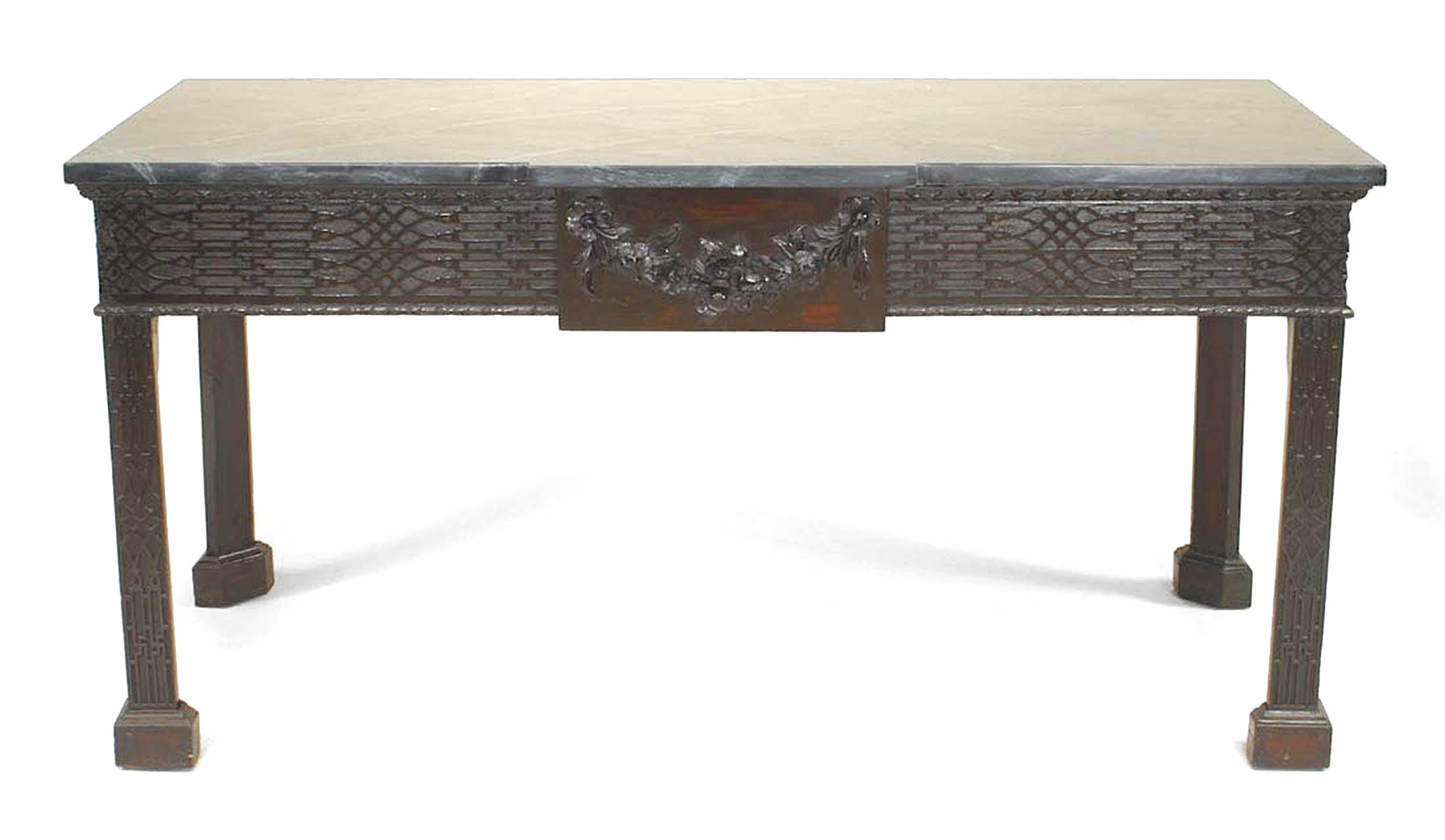 English Chinese Chippendale-style (Late 19th Century) mahogany console table with green marble top and fretwork carved frieze centered with a floral garland tablet.
