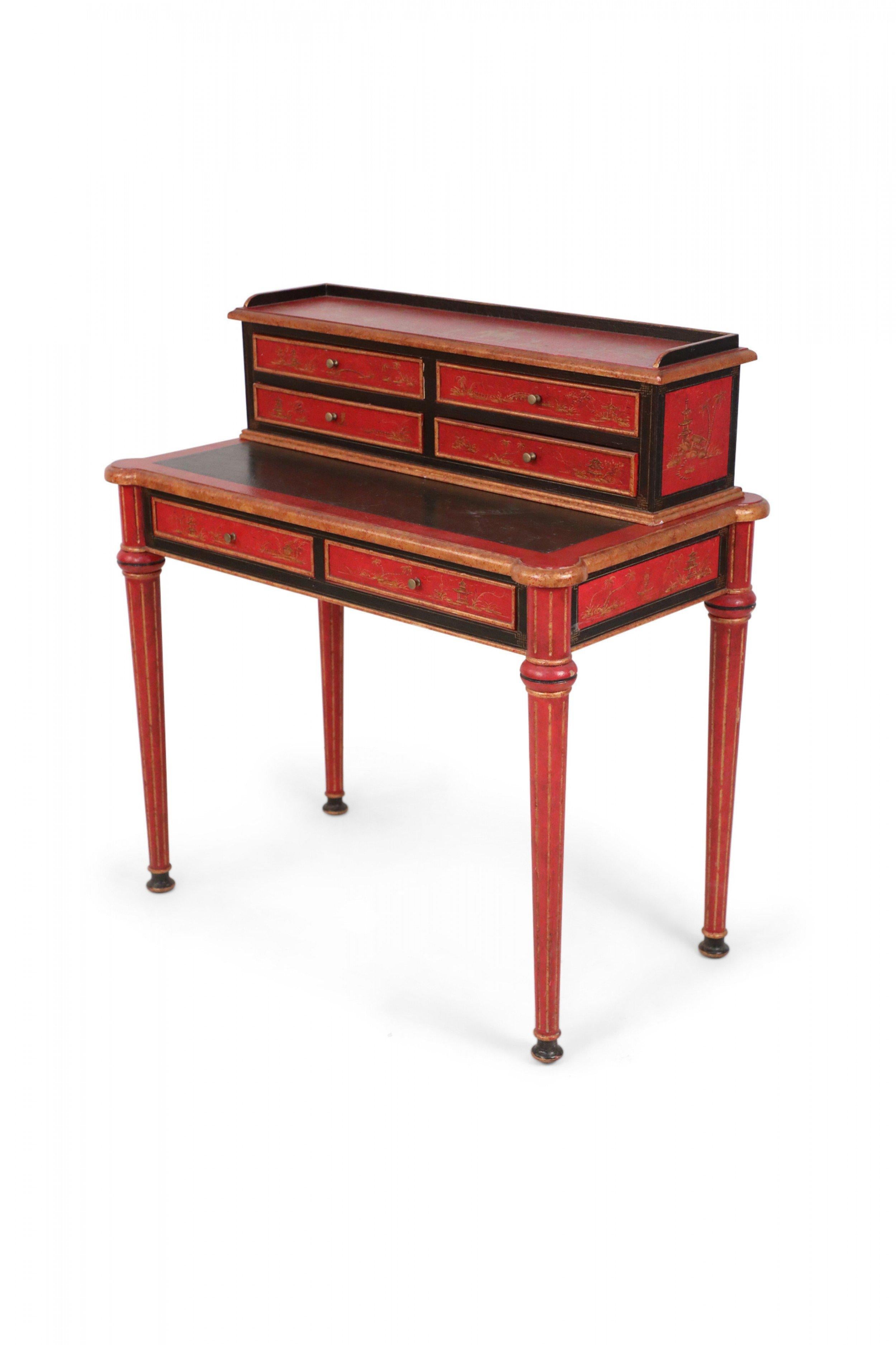 English Georgian-style contemporary black and red faux lacquer Chinoiserie two-piece secretary desk with rounded corners and a black top with red trim and painted genre landscape scene with detachable top drawer set and incised tapered legs.
 