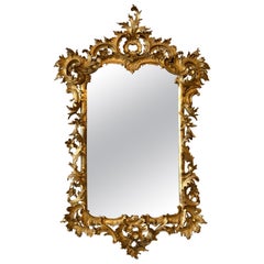 Miroir Chippendale anglais en bois doré sculpté, 18ème siècle