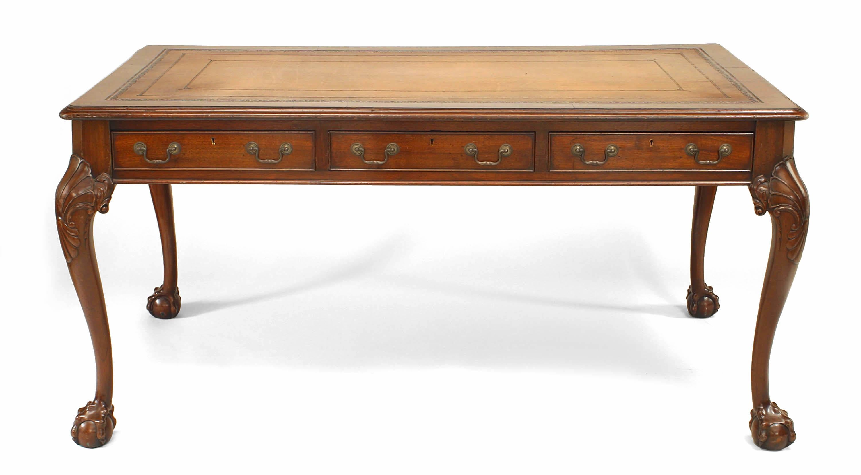 English Chippendale style (20th Century) mahogany 3 drawer table desk with brown leather top.
