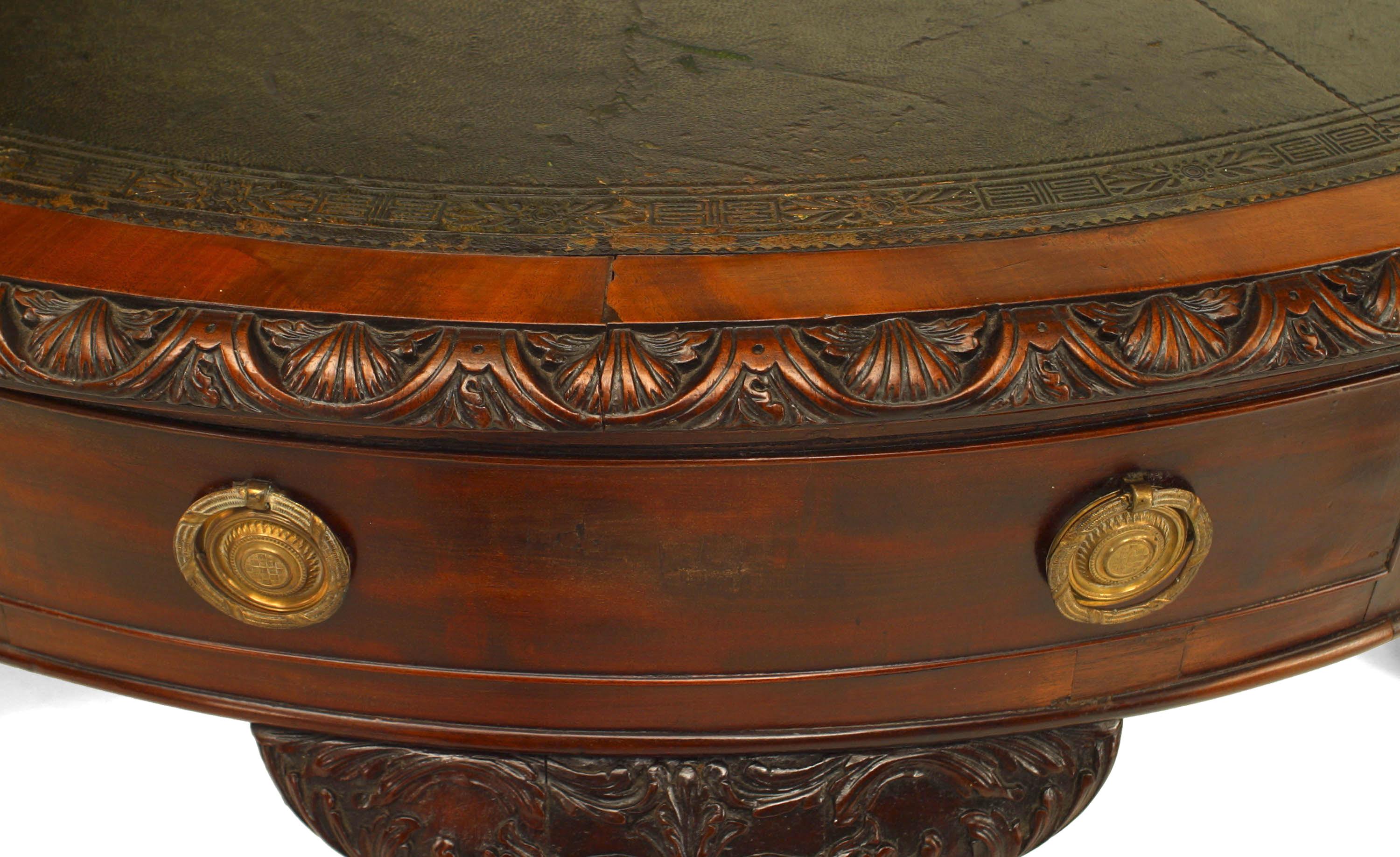 English Chippendale style (18/19th Century) mahogany landlord style drum design center table with 4 drawers and round green leather top.