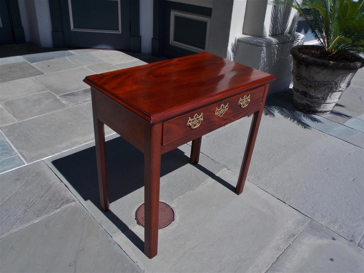 English Chippendale mahogany one-drawer side table with the original flanking and centered brasses, Late 18th century.