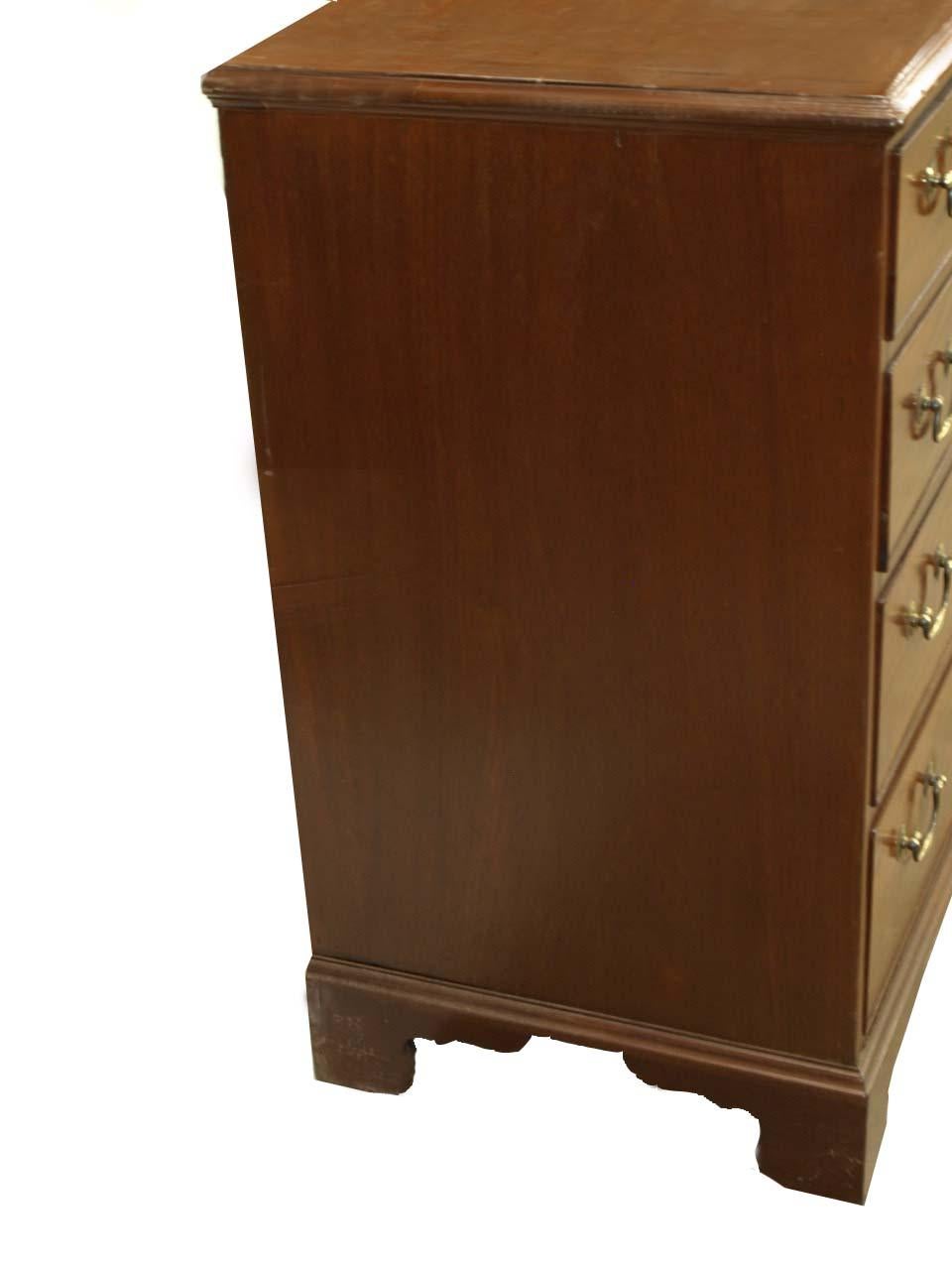 English Chippendale mahogany three over three drawer chest, With beautiful color and good proportions, this chest can serve multiple functions in home . The brass swan neck pulls are not original, but it would have had the same style pulls when it