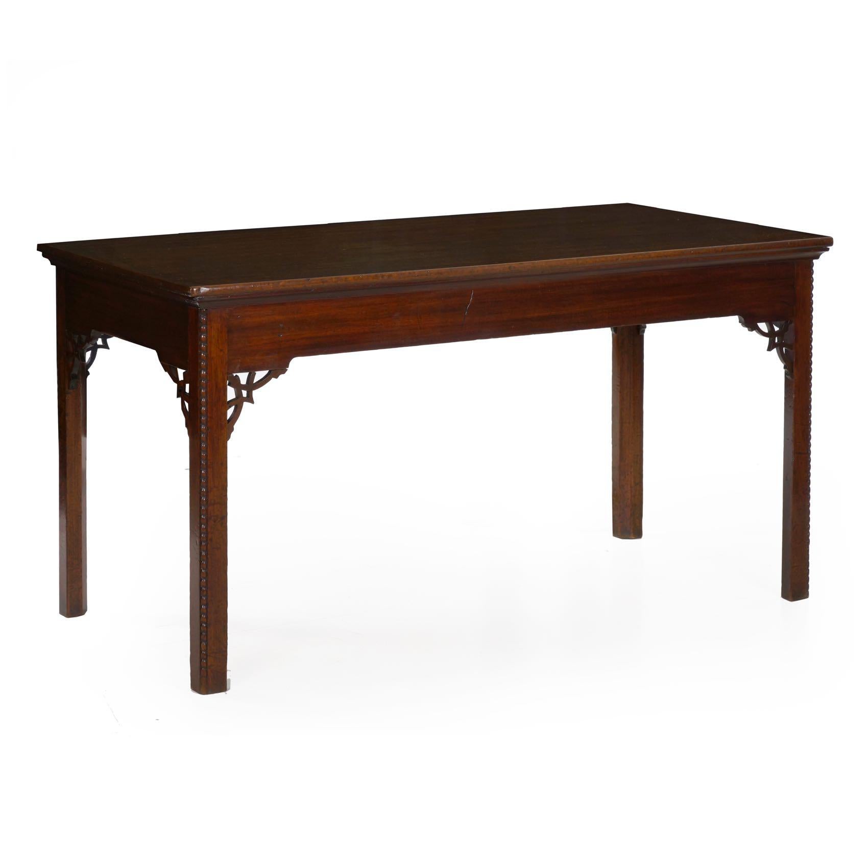 An excellent Chippendale console table crafted of dense solid mahogany during the third quarter of the 18th century, the form is simple and clean. Intended to serve as a center table, it has been designed such that it presents beautifully from all