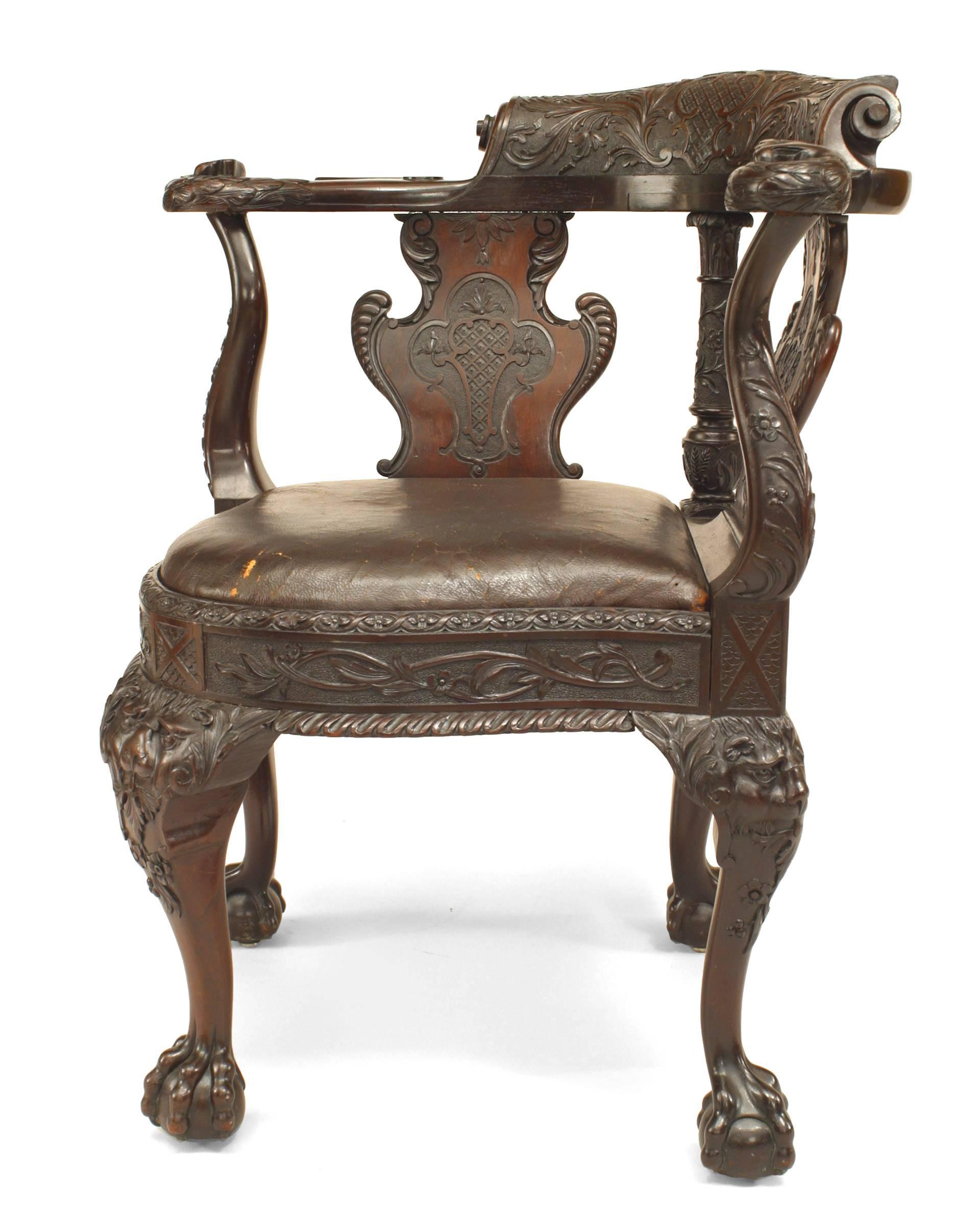 English Chippendale style (18th-19th century) carved mahogany shield splat back corner armchair with brown leather seat.
 