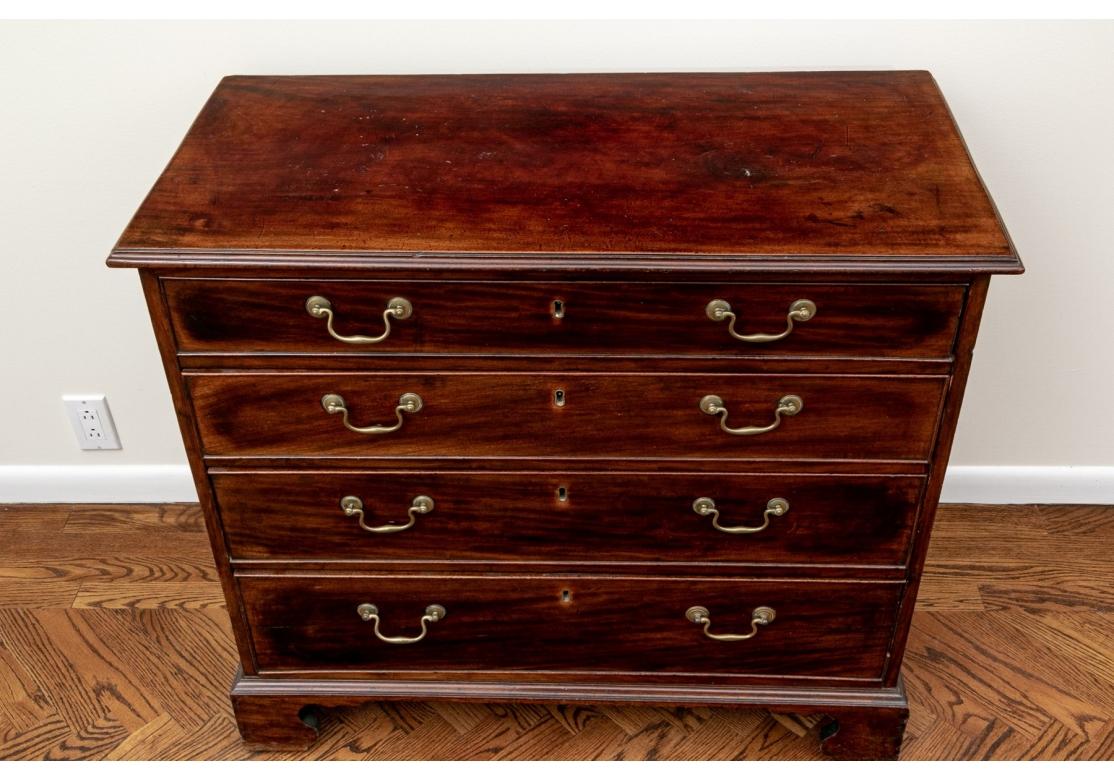 18th Century Chippendale four drawer Chest for restoration. Mahogany chest of drawers having a fine form with four graduate drawers with beading trim in the original finish. This rests on ogee bracket feet with brass pulls and escutcheon.