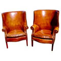 English Chippendale Style Pair of Leather Upholstered Wing Chairs