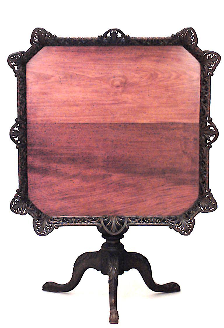 English Chippendale-style (18/19th Century) mahogany pedestal base tilt top tea table with square filigree gallery top.
