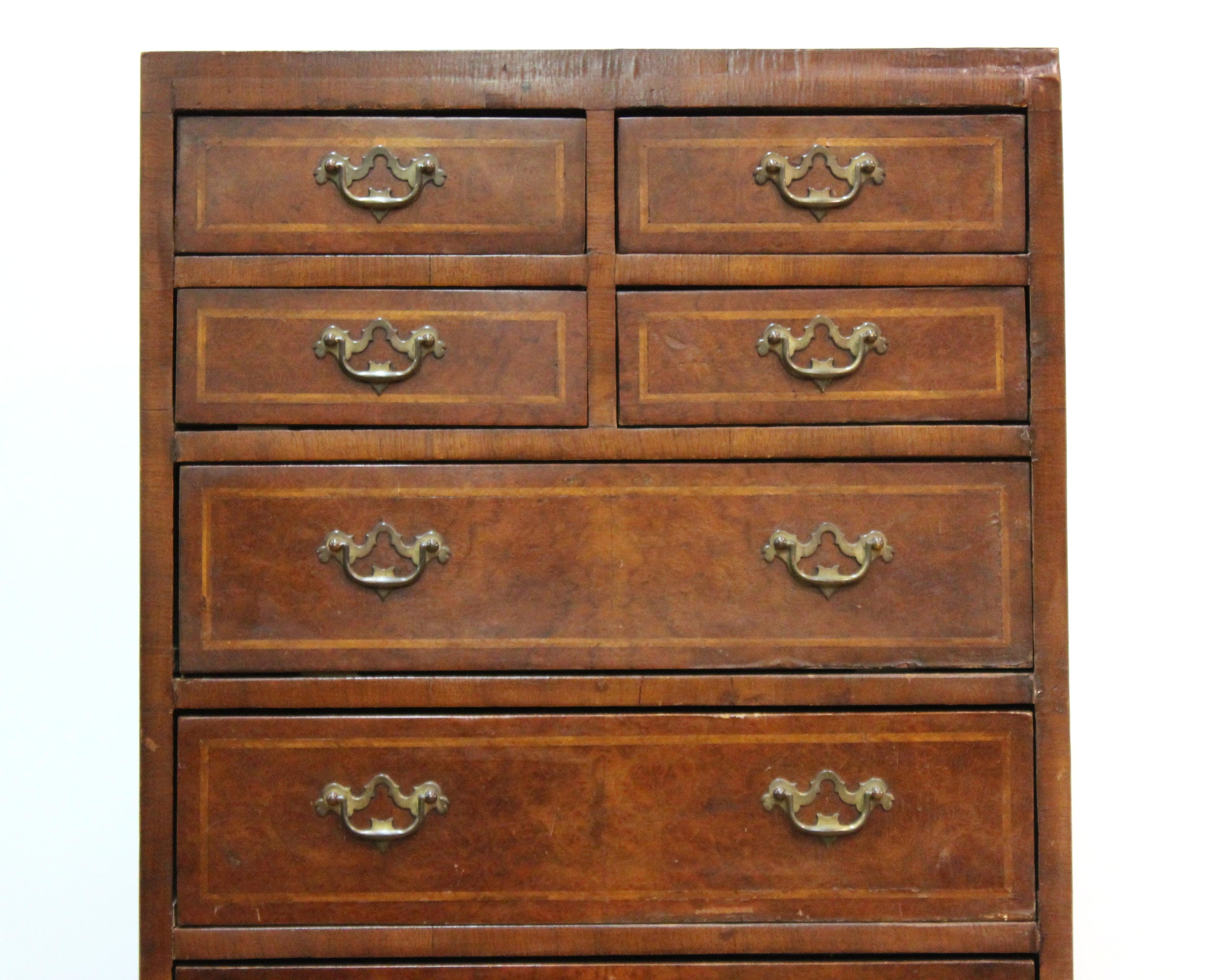 English Chippendale style tall chest of drawers, two smaller drawers on upper two levels above five levels of single drawers.
From the Estate of designer, model, television host, and business woman, Nina Griscom.