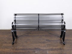 English Circa 1900 Black Painted Strap Iron Garden Bench with Scroll Arms