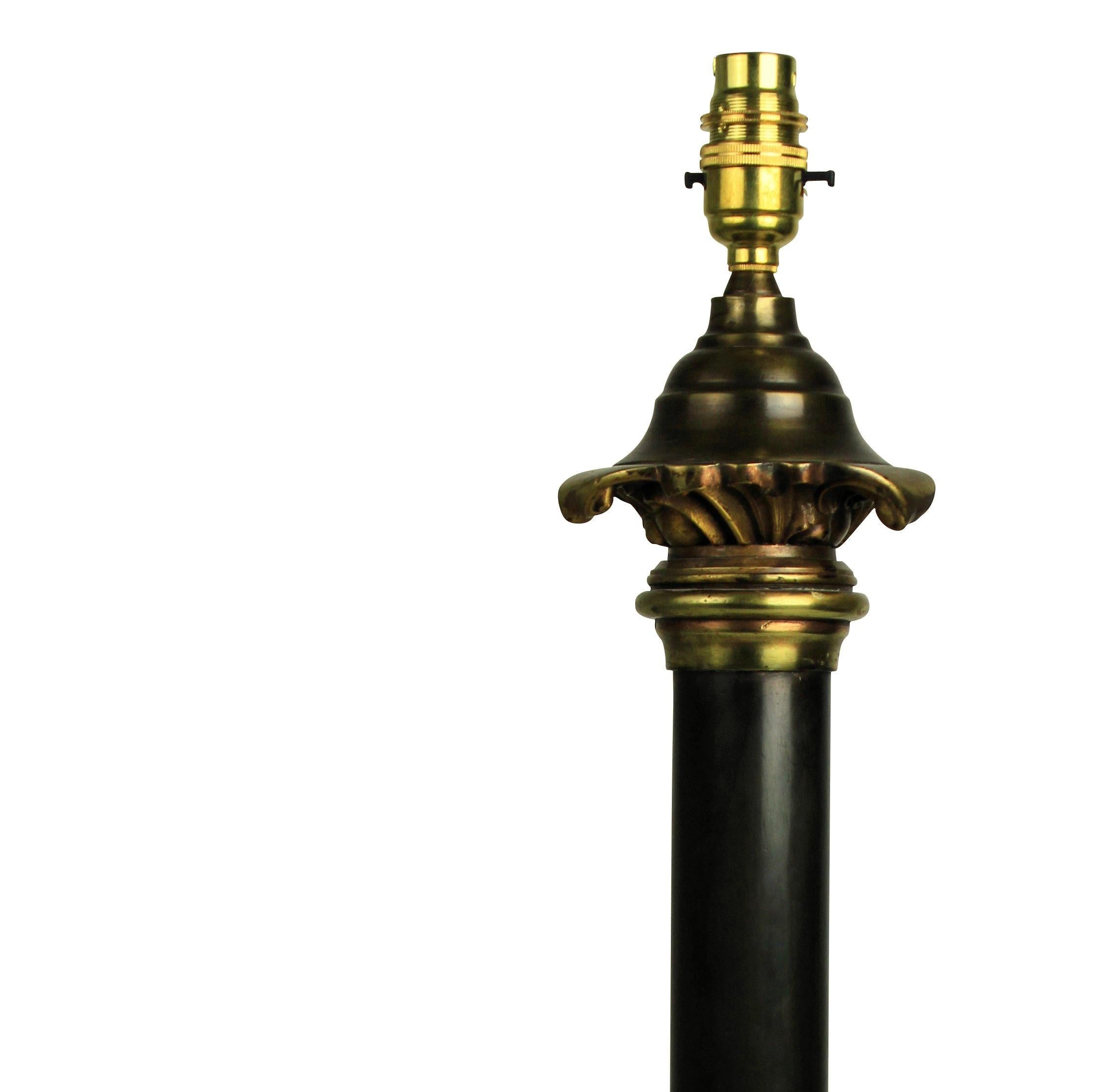 An English bronze and ormolu table lamp, formerly for oil.

Subjected to VAT.