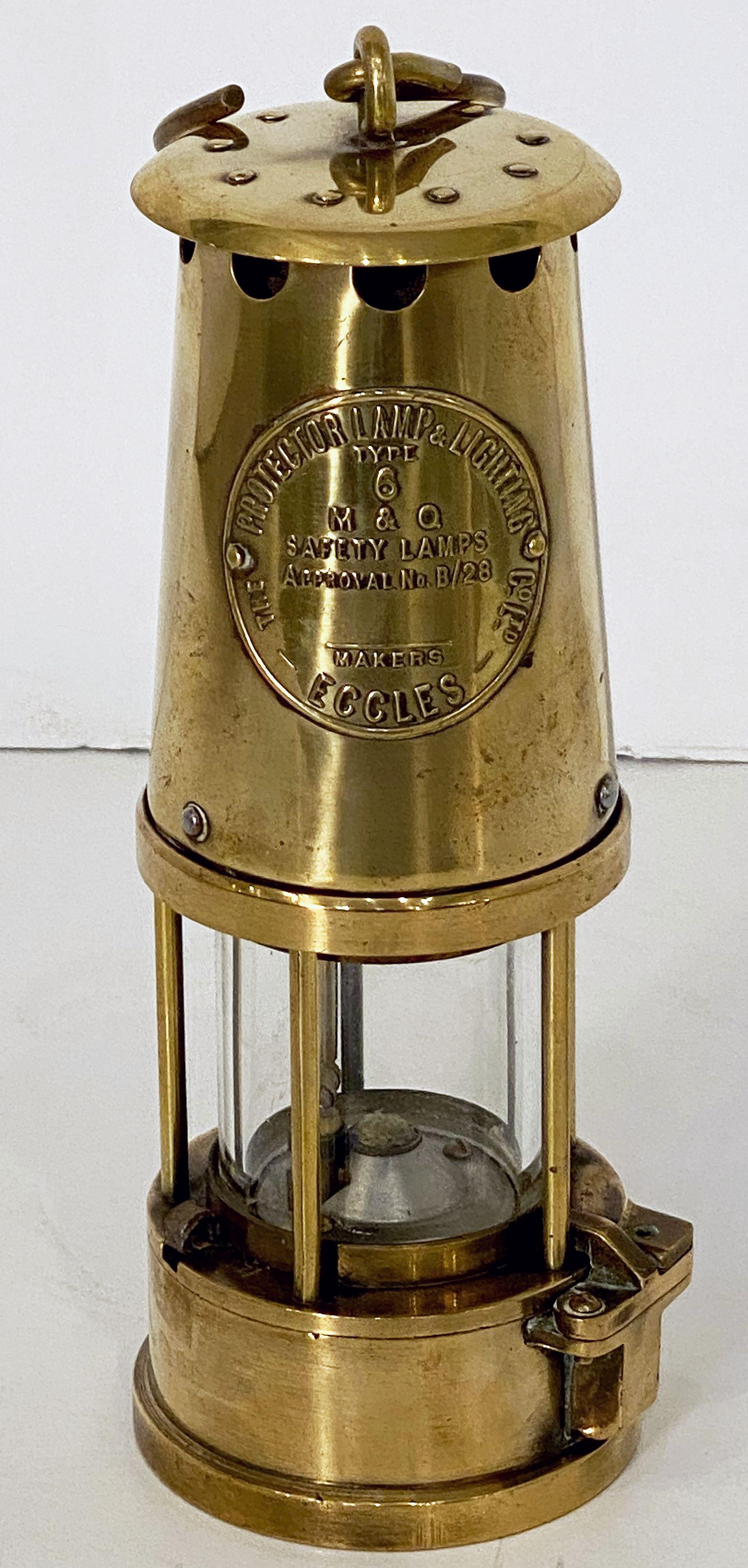 A fine vintage English miner's lamp or inspector's safety lantern of brass and steel in working order.
With maker's label - Inscription reads:

