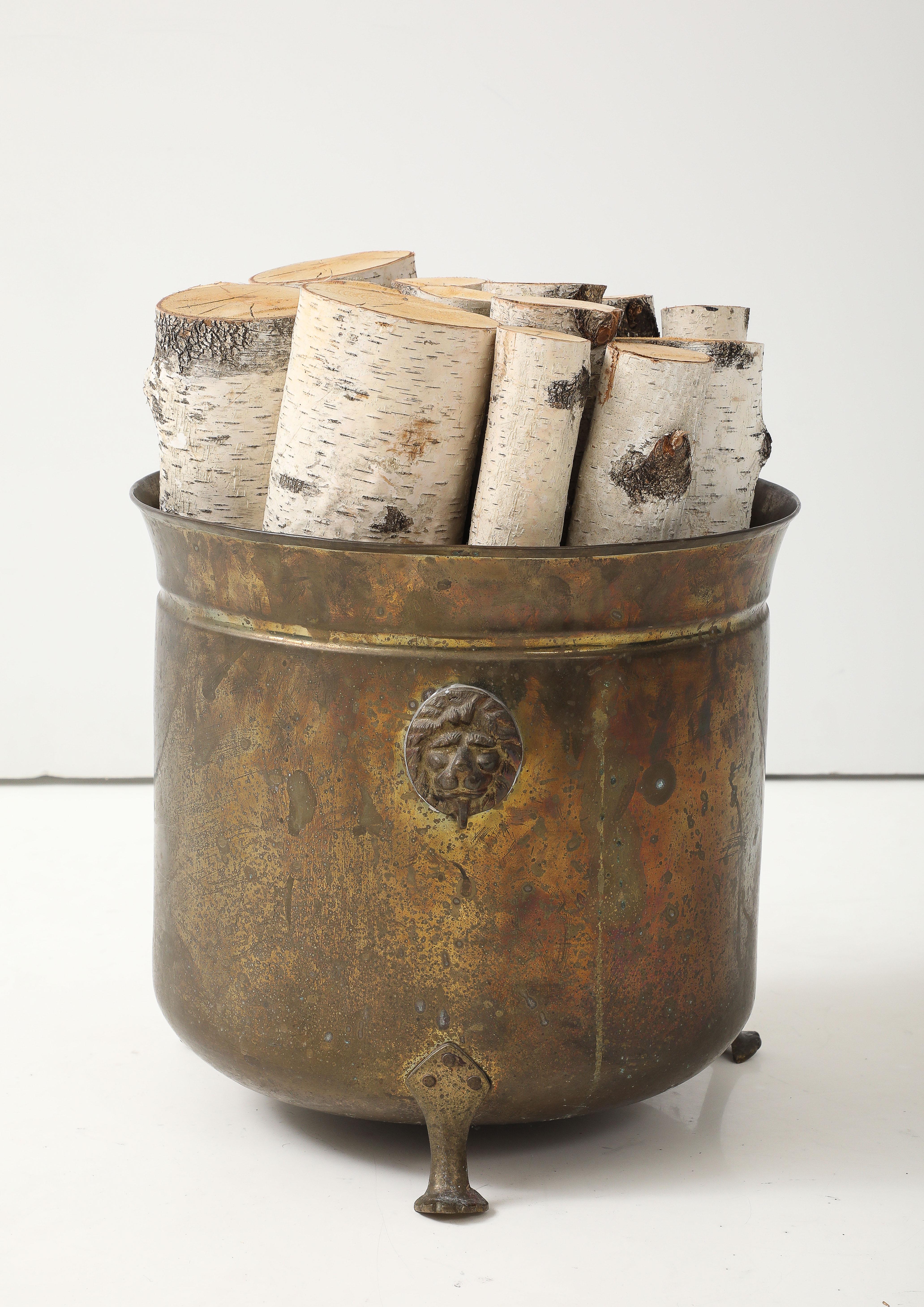 Decorative Early 20th century bronze/brass coal scuttle now used for kindling wood storage.
