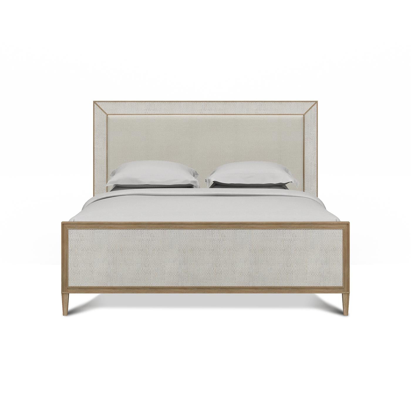 This stunning bedframe combines the relaxed elegance of coastal design with modern sophistication, creating a tranquil retreat in your home.

With a mahogany frame in our light sandbar finish, with a headboard inset with Dinara natural performance