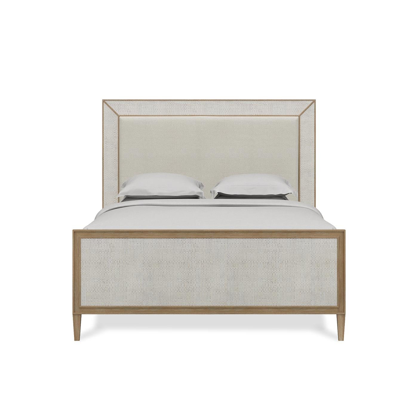 This stunning bedframe combines the relaxed elegance of coastal design with modern sophistication, creating a tranquil retreat in your home.

With a mahogany frame in our light sandbar finish, with a headboard inset with Dinara natural performance