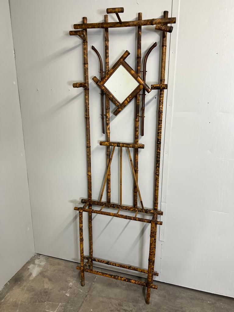 Antique English Colonial Rattan Cane Bamboo coat hanger and umbrella stand with mirror

In very good vintage condition and have a lovely patina, Handmade bamboo stand

ready for that special place in your home to enjoy!

Measures: height 196cm,