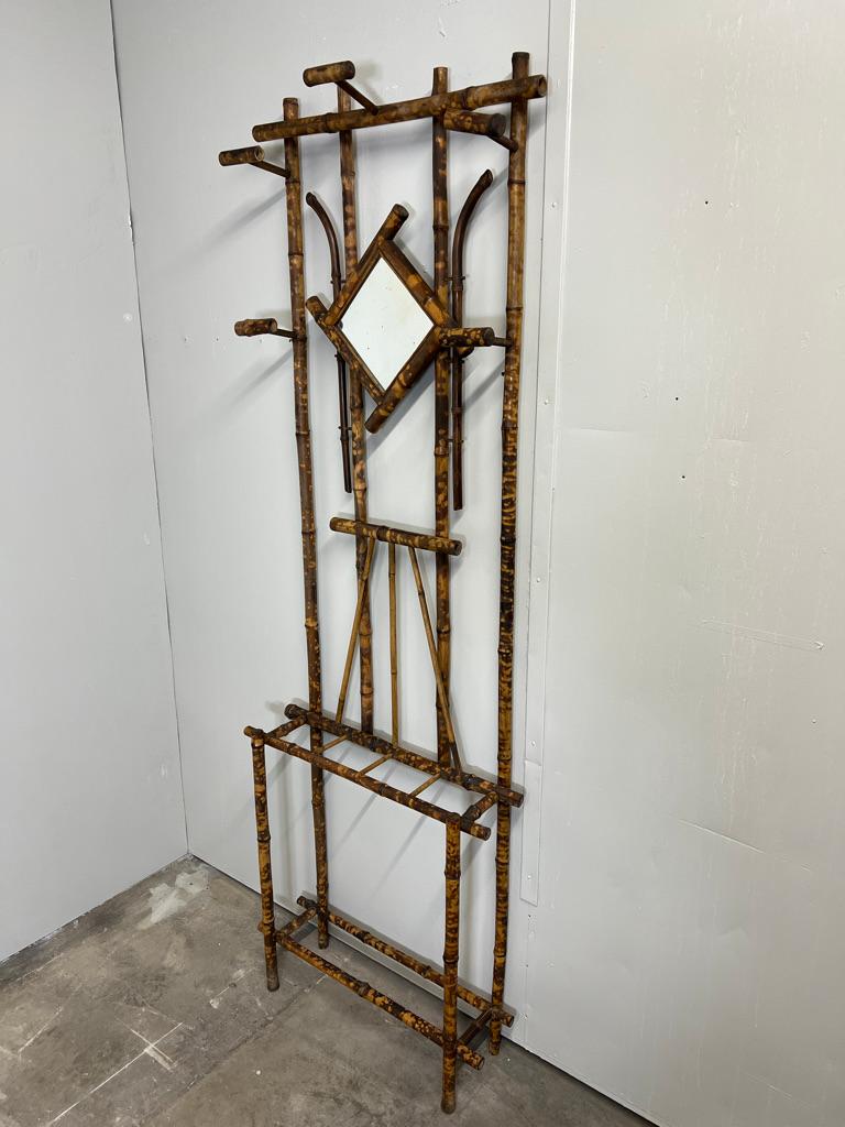 Dutch Colonial English Colonial Rattan Cane Bamboo coat hanger and umbrella stand with mirror For Sale