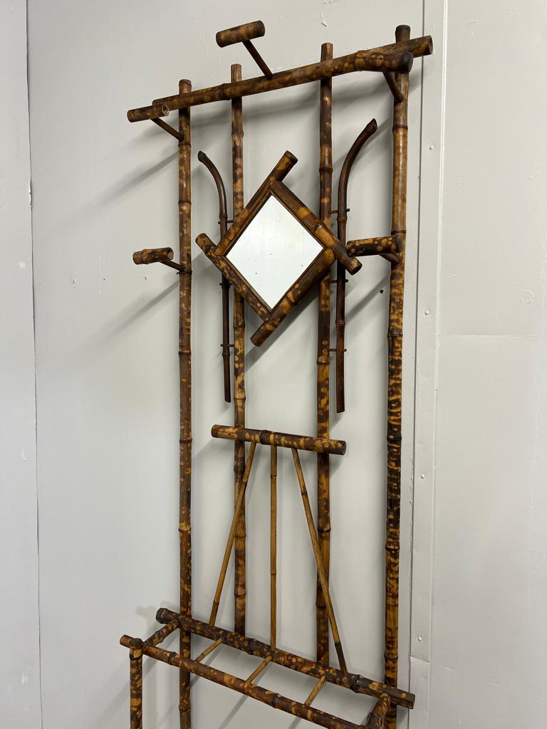 English Colonial Rattan Cane Bamboo coat hanger and umbrella stand with mirror In Good Condition For Sale In Markington, GB