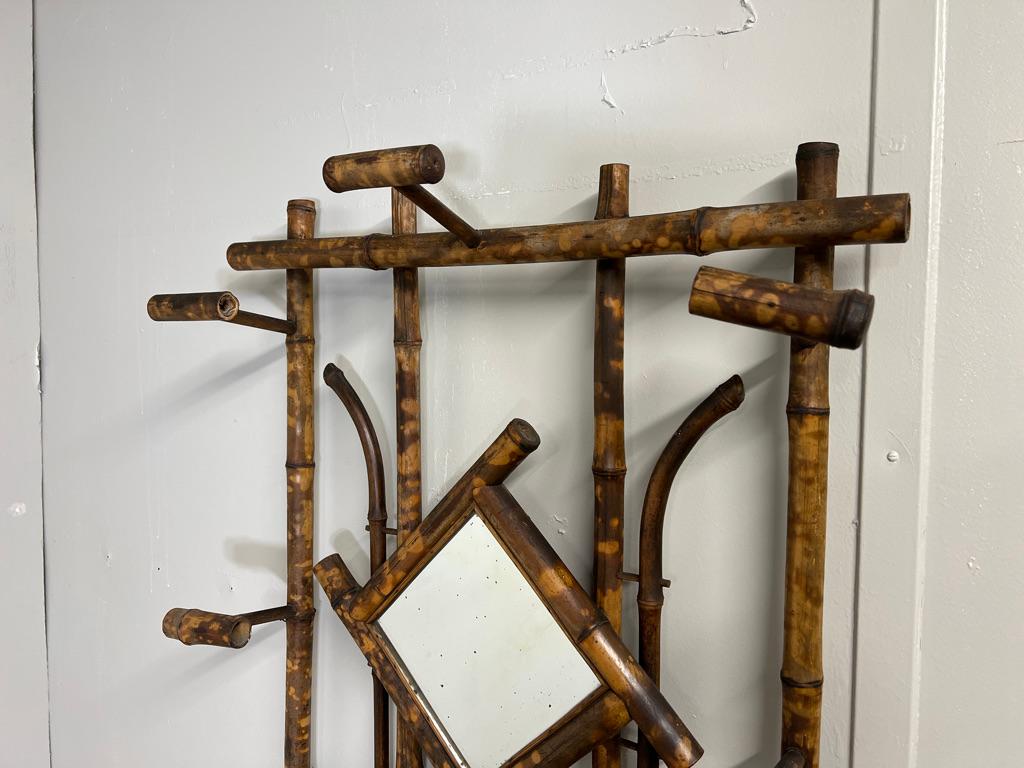 English Colonial Rattan Cane Bamboo coat hanger and umbrella stand with mirror For Sale 1