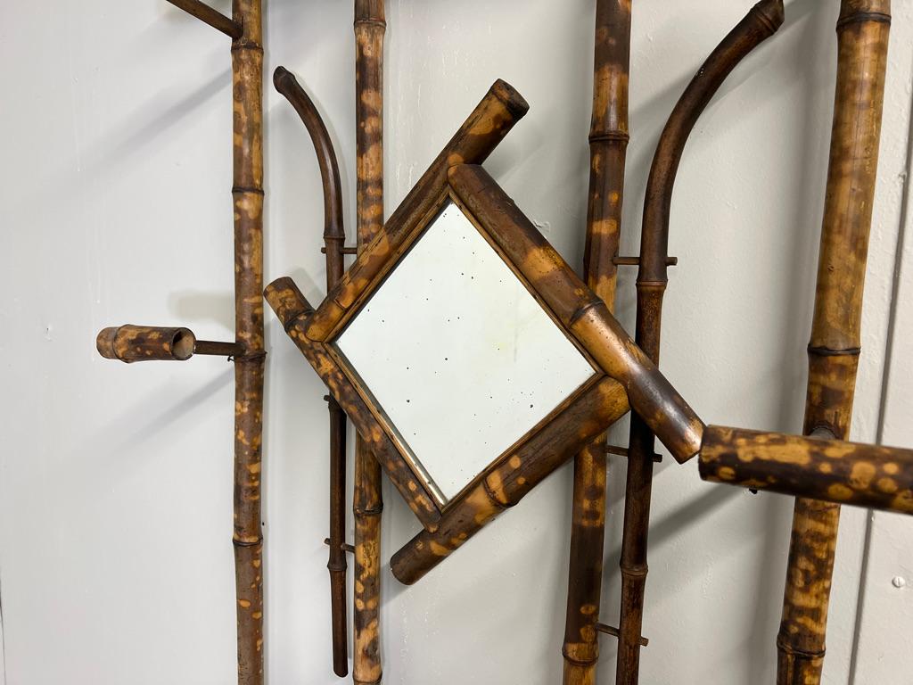 English Colonial Rattan Cane Bamboo coat hanger and umbrella stand with mirror For Sale 2