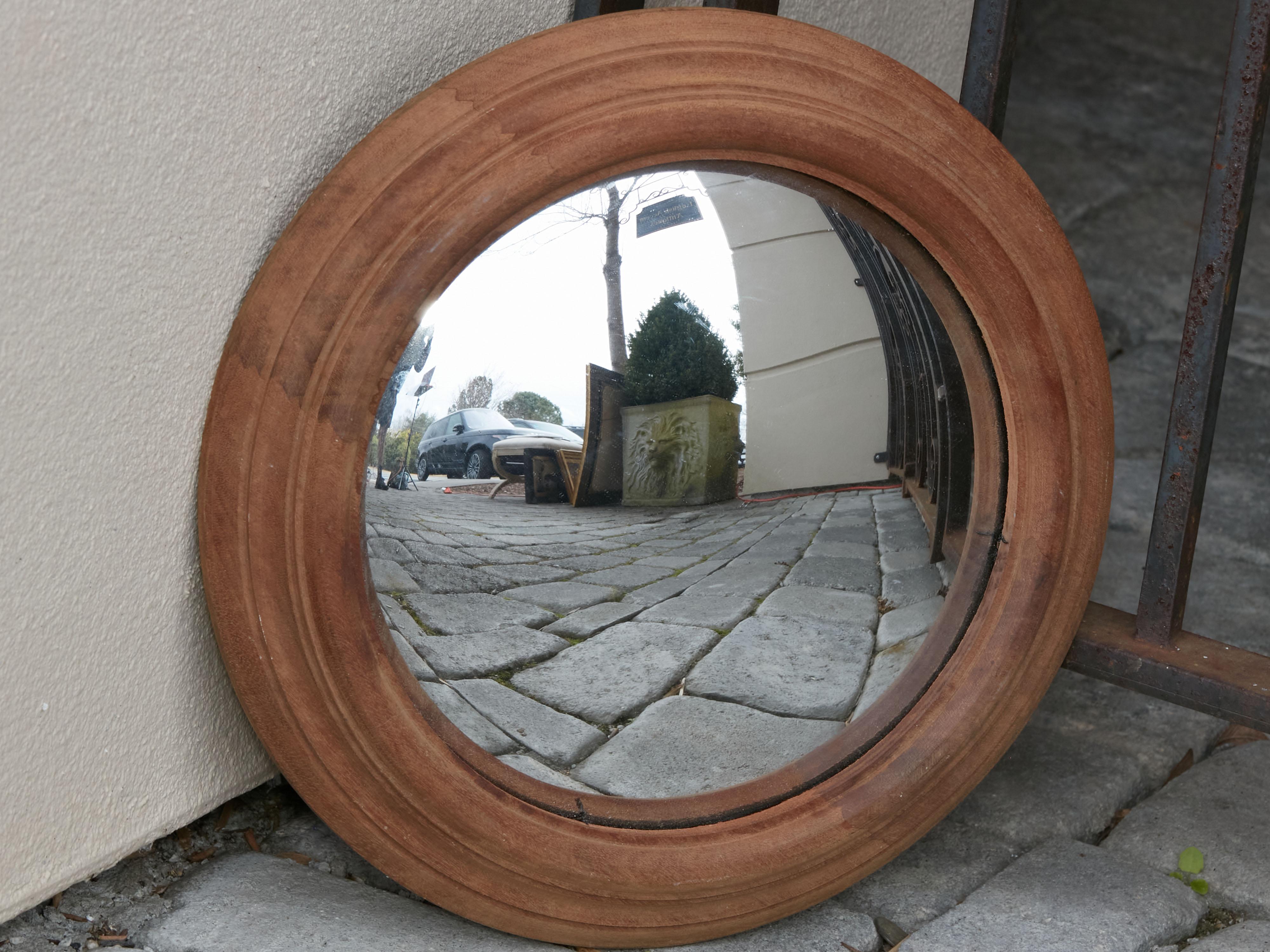 20th Century English Convex Bullseye Mirror with Circular Wooden Frame For Sale