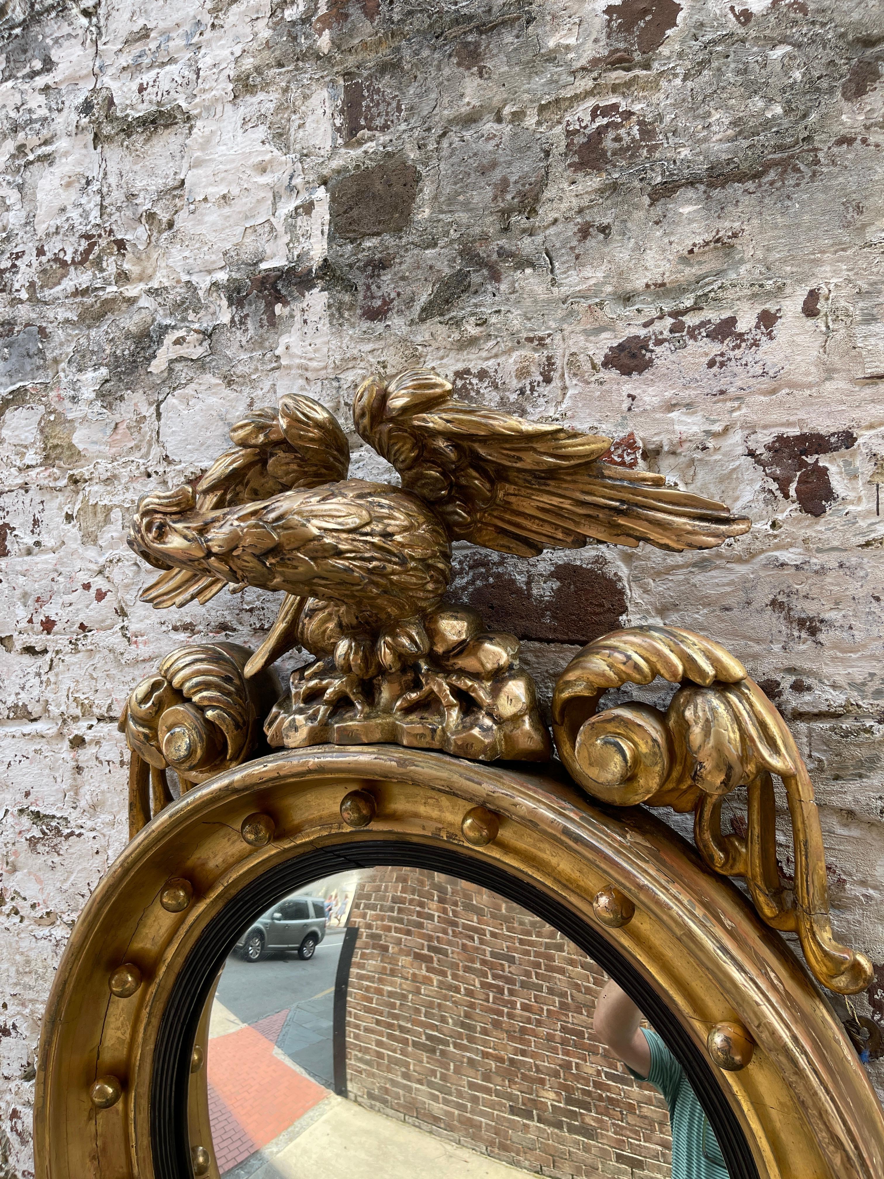 English convex mirror with bold eagle on plinth 19th century  In Good Condition For Sale In Charleston, SC