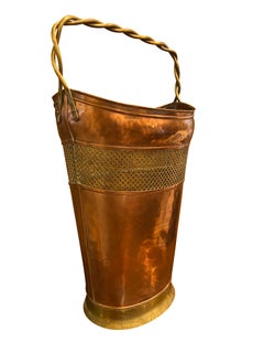 Cesta inglesa de cobre y latón para chimenea