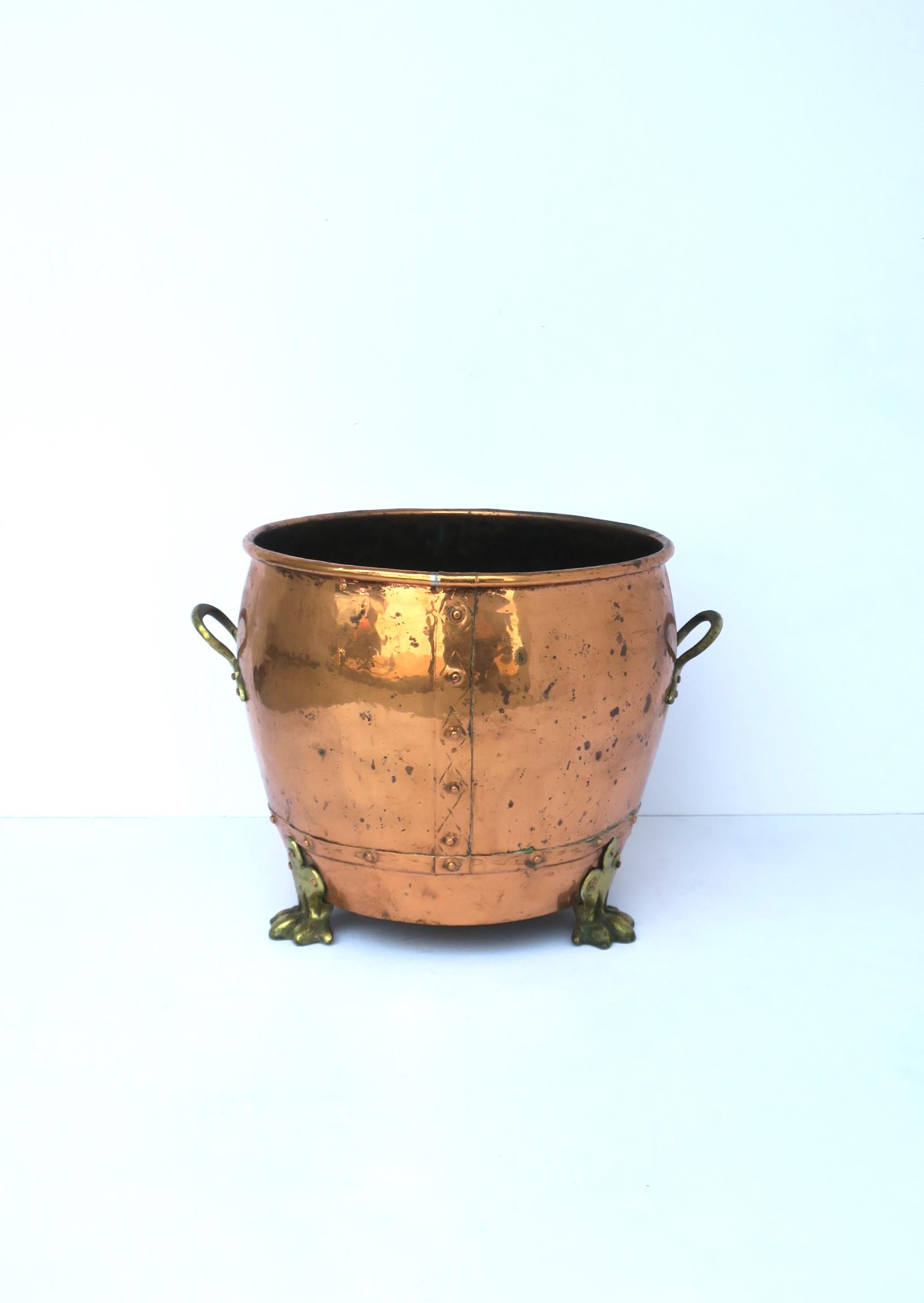 Hand-Crafted English Copper and Brass Fireplace Chimney or Firewood Pot with Lion Paw Feet