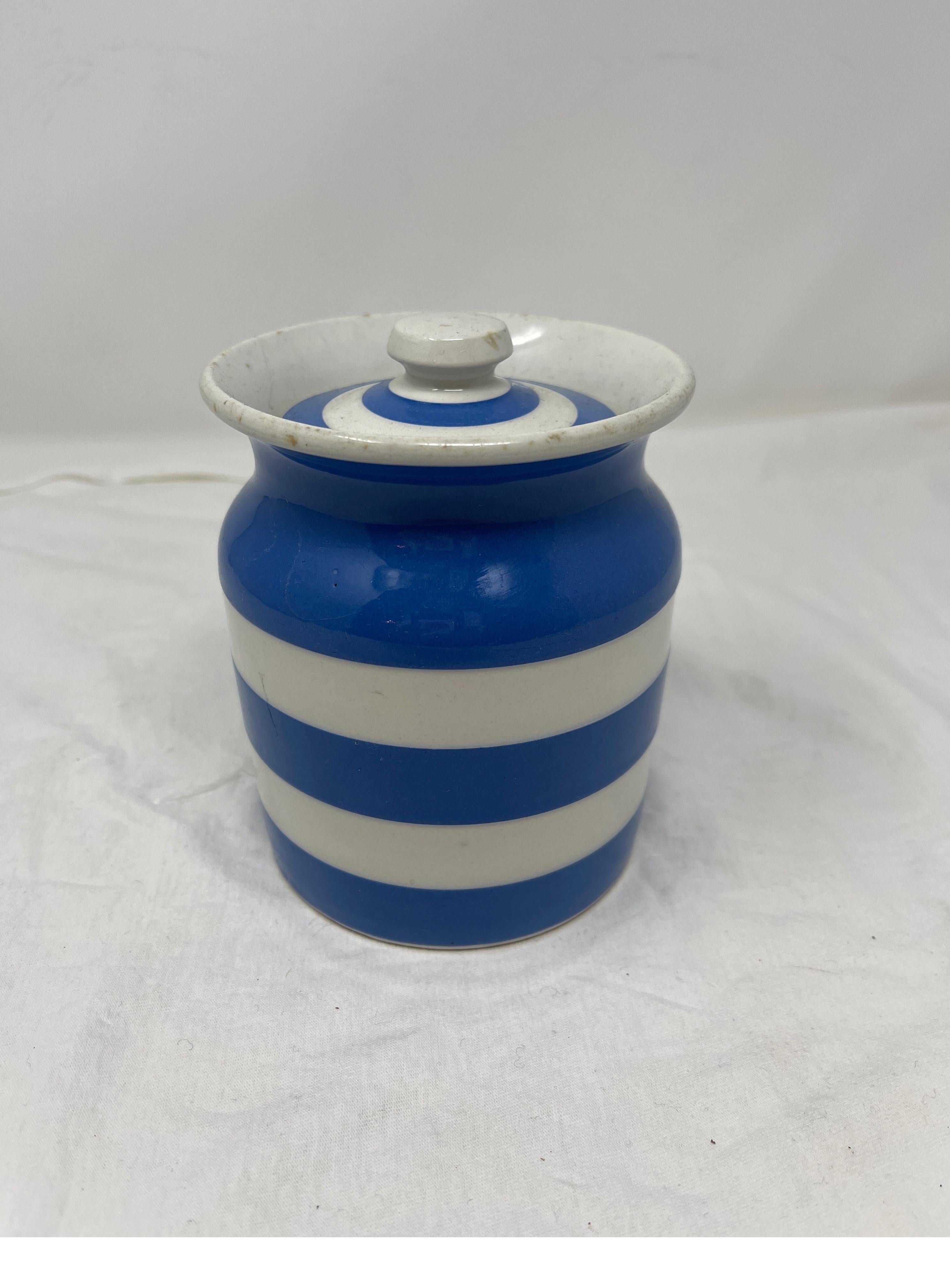 This iconic T. G. Green Cornishware canister in happy blue and white stripes would be an adorable addition to your kitchen countertop. Set it next to your coffeemaker to hold your sugar or use in your bathroom to hold your cotton balls. In either