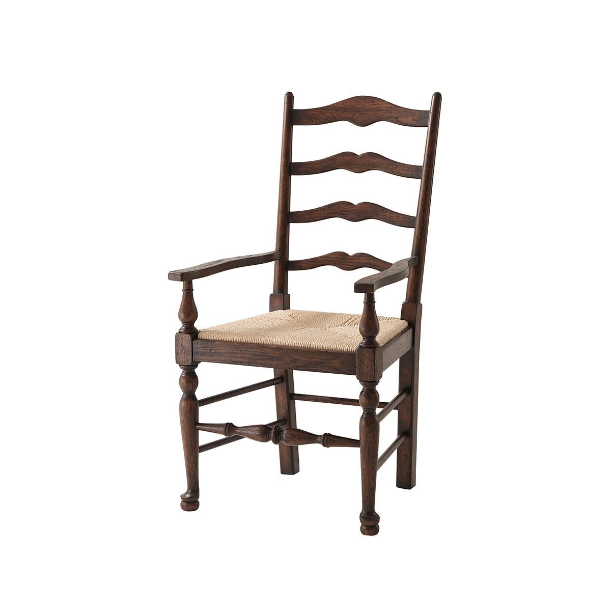 Oak ladder back armchairs, the bow arched bars between turned supports, above a hand woven faux rush seat, on turned legs with pad and ball feet. Inspired by an 18th century English original.
Dimensions: 22.25