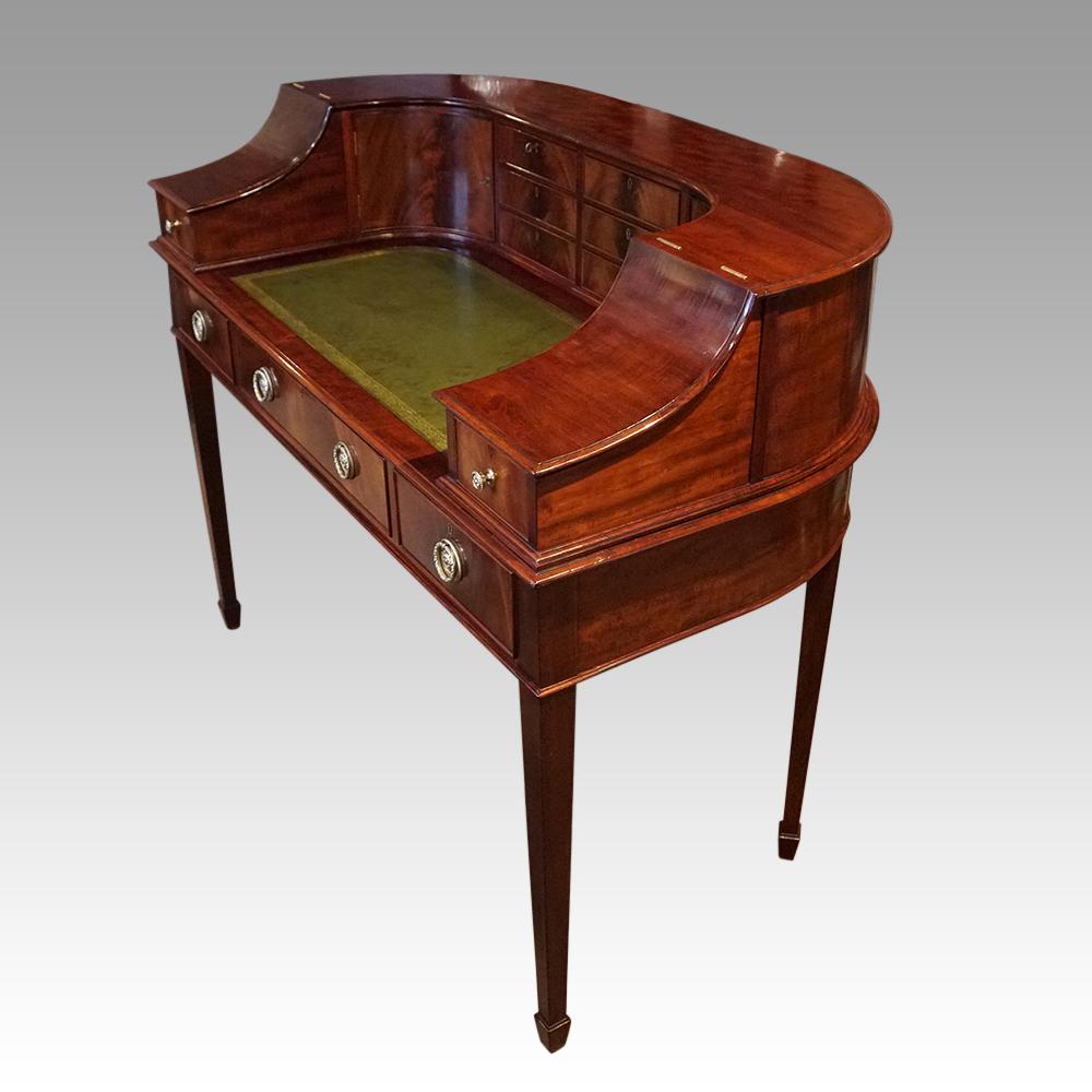 English country house Edwardian Carlton house desk
This Edwardian Carlton house desk was made circa 1900.

Carlton House desks are following designs of the original desk that were in the Carlton House mansion that was owned by George IV in Pall