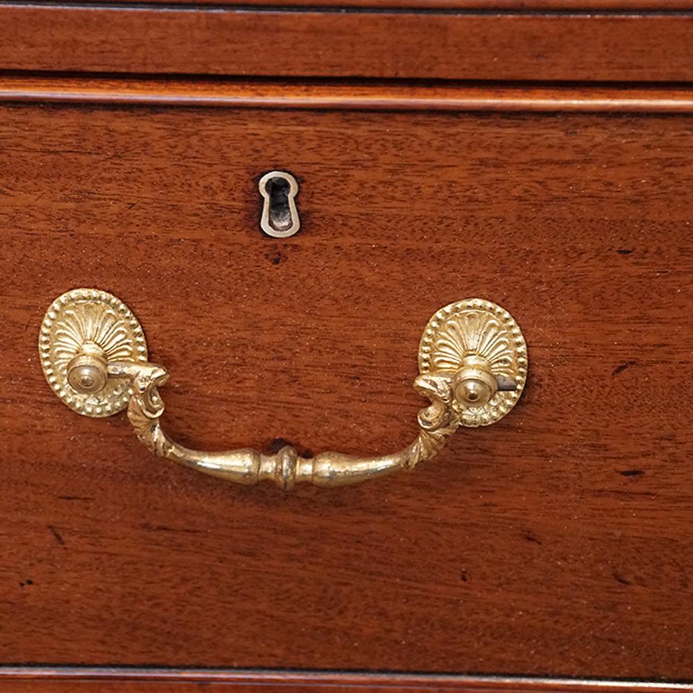 George III mahogany cupboard press 
This George III mahogany cupboard press was made circa 1795.
The pair of mahogany doors with indent corners with fine turned roundels that open to reveal the oak lined slides covered in the original blue